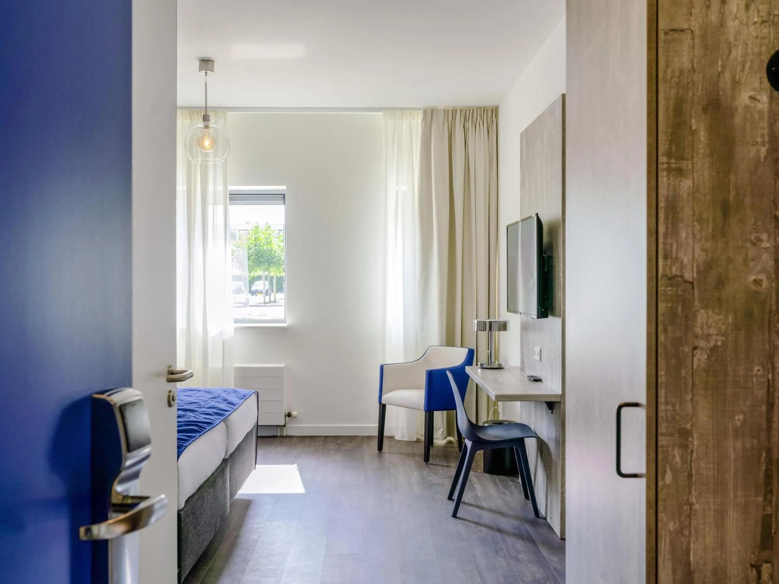 Bedroom in ibis Styles Almere