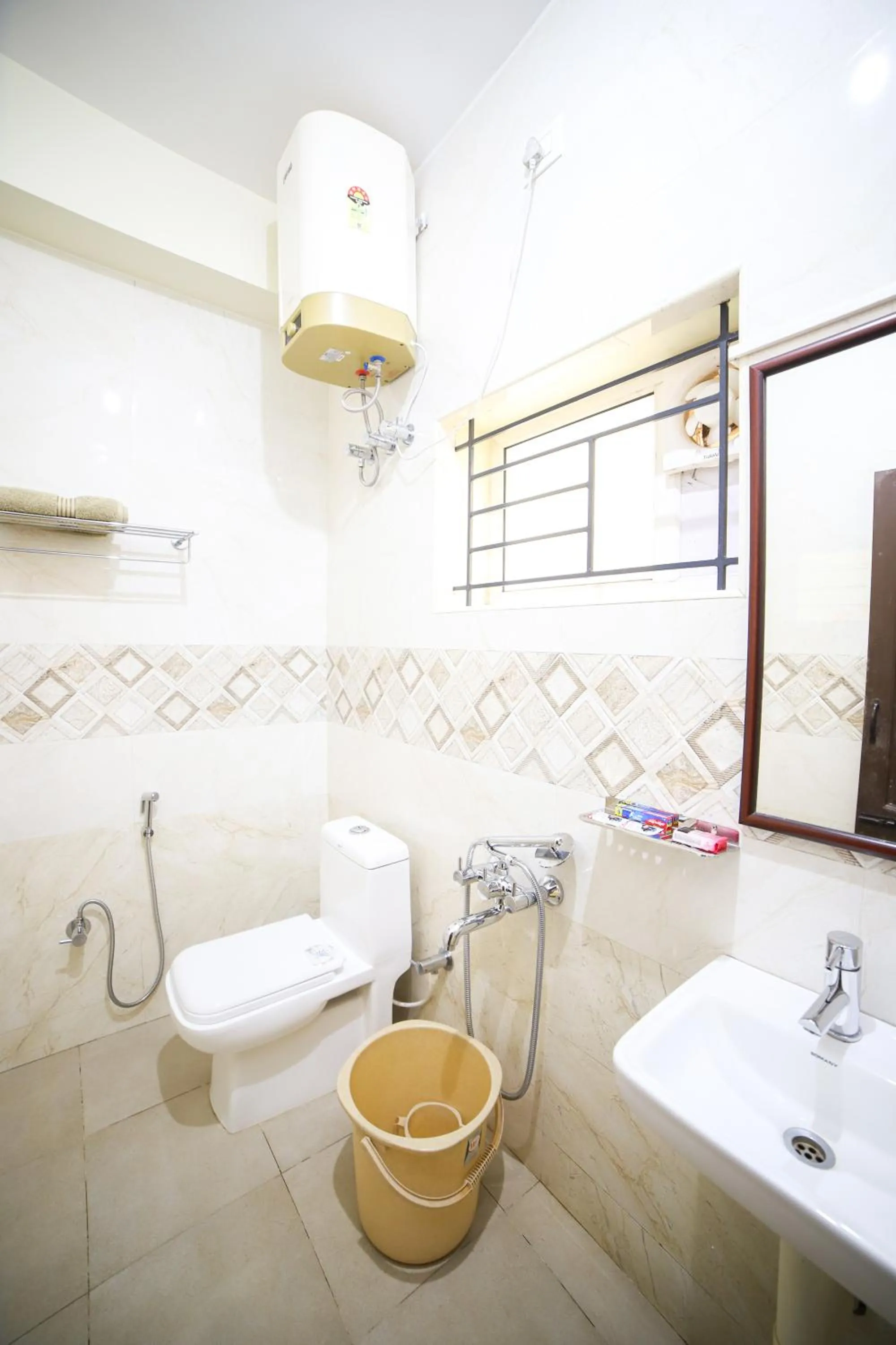 Bathroom in Aira Residency Kothagiri by Lexstays