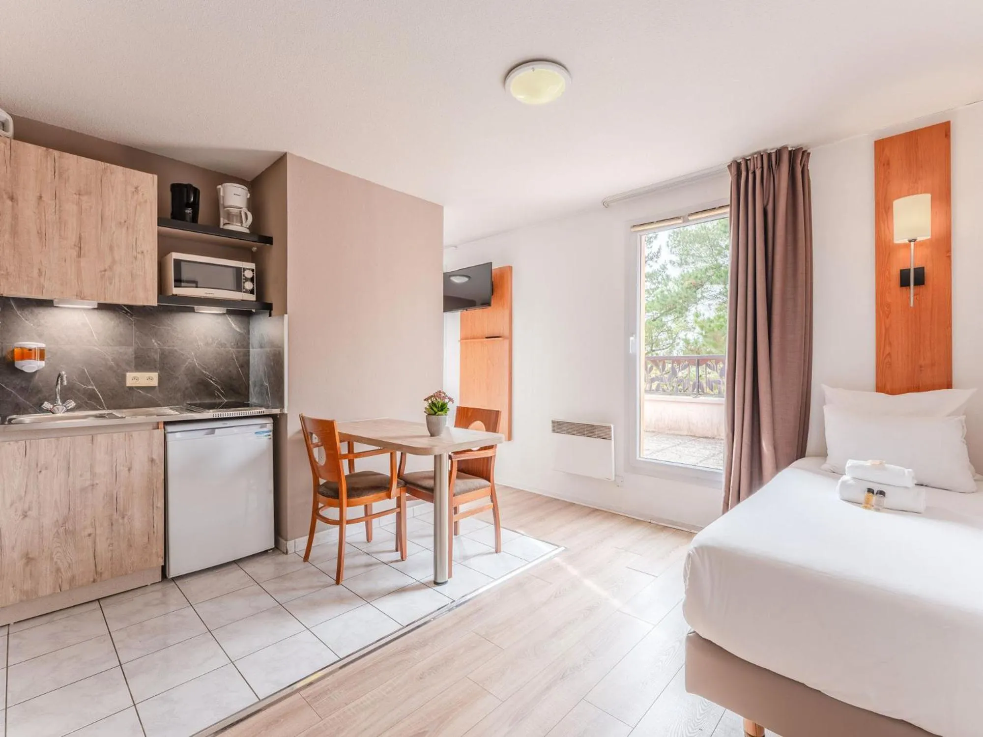 Bedroom in Séjours & Affaires Nantes La Beaujoire