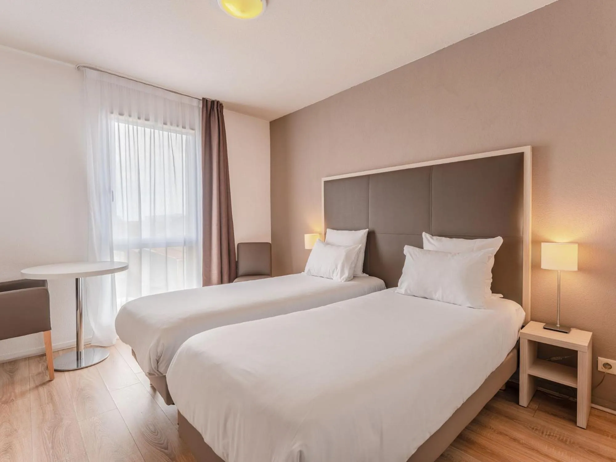 Bedroom, Bed in Séjours & Affaires Nantes La Beaujoire