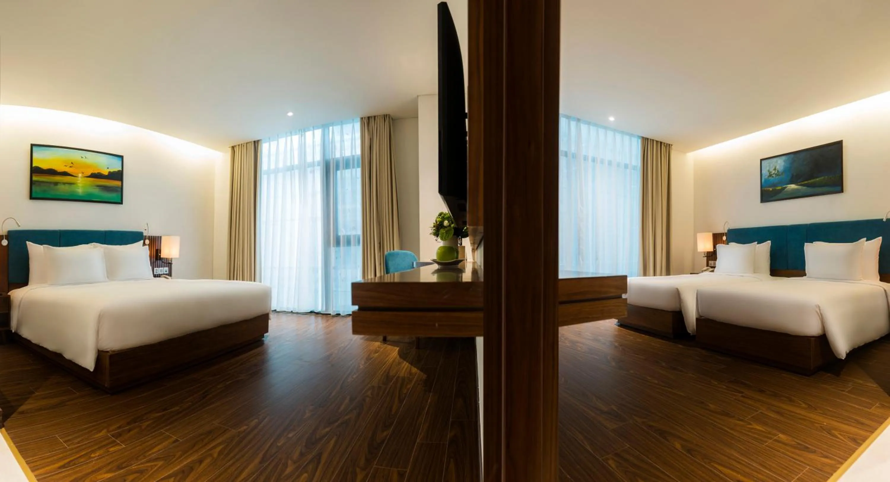 Photo of the whole room, Bed in Maximilan Danang Beach Hotel