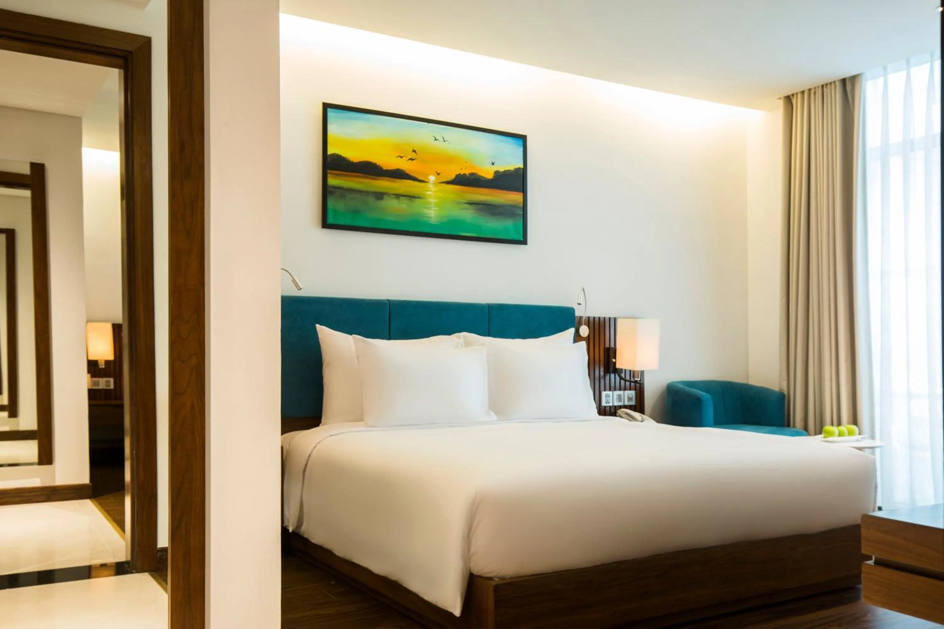 Photo of the whole room, Bed in Maximilan Danang Beach Hotel