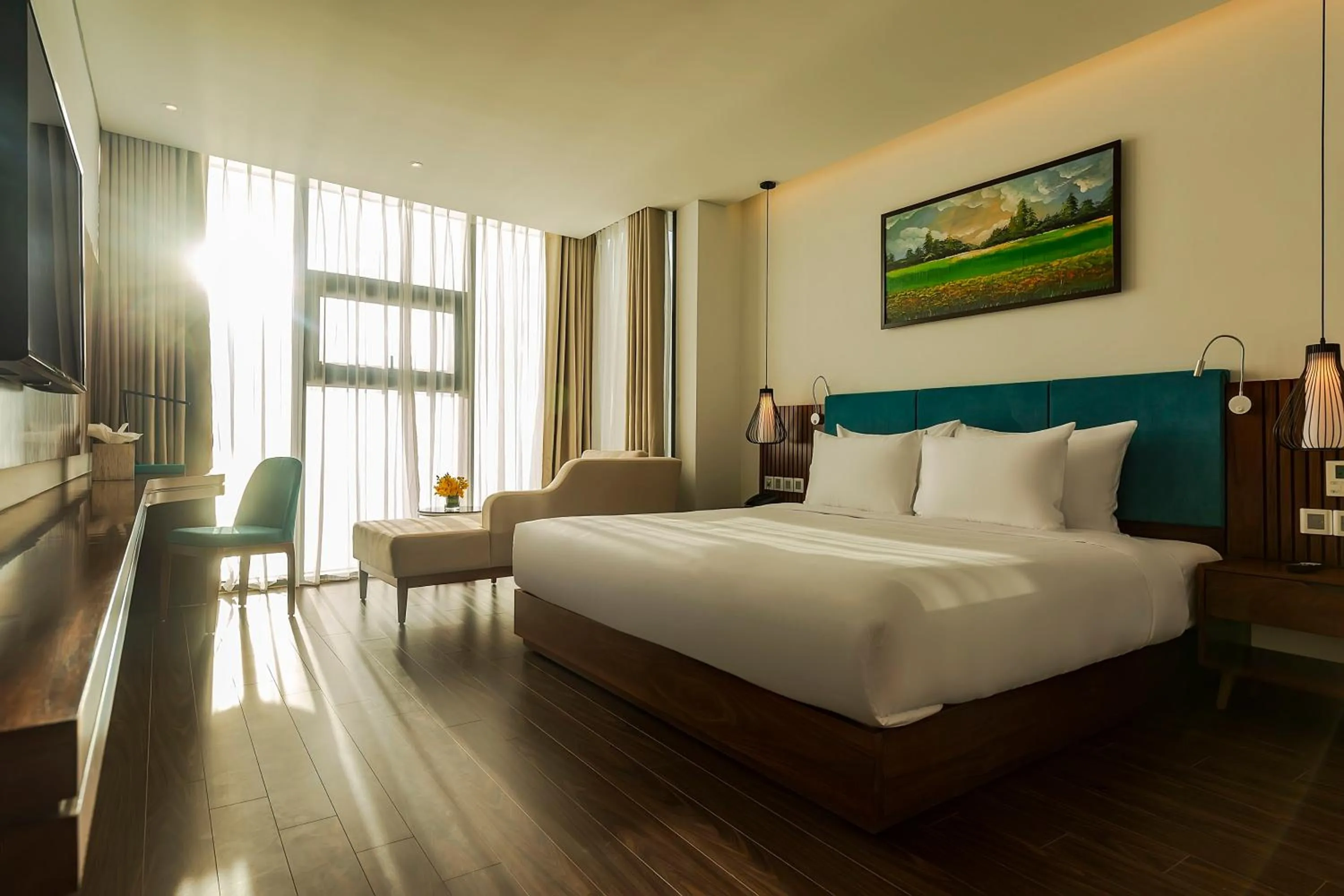 Photo of the whole room, Bed in Maximilan Danang Beach Hotel