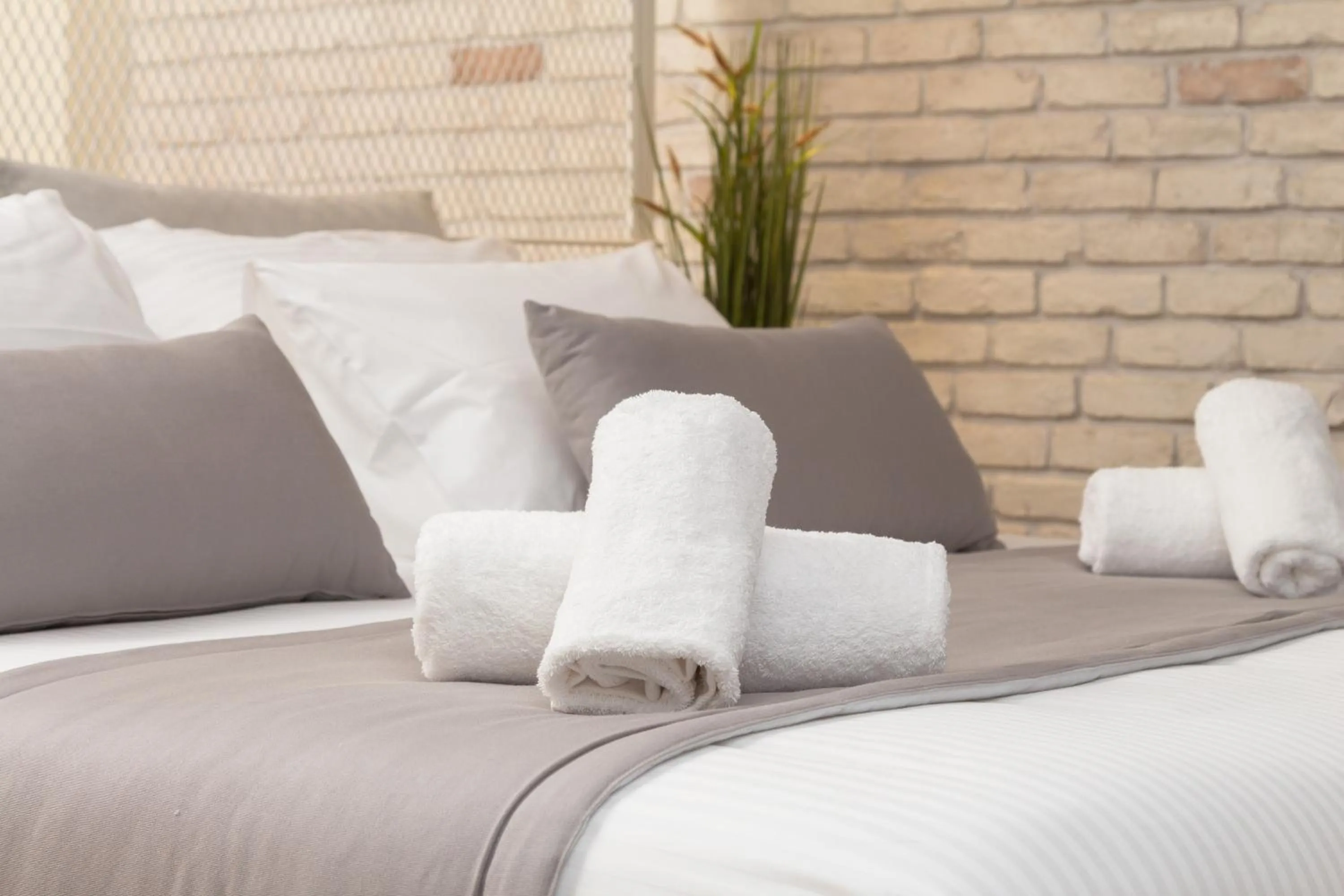 Bed in SUITES@SYNGROU-FIX