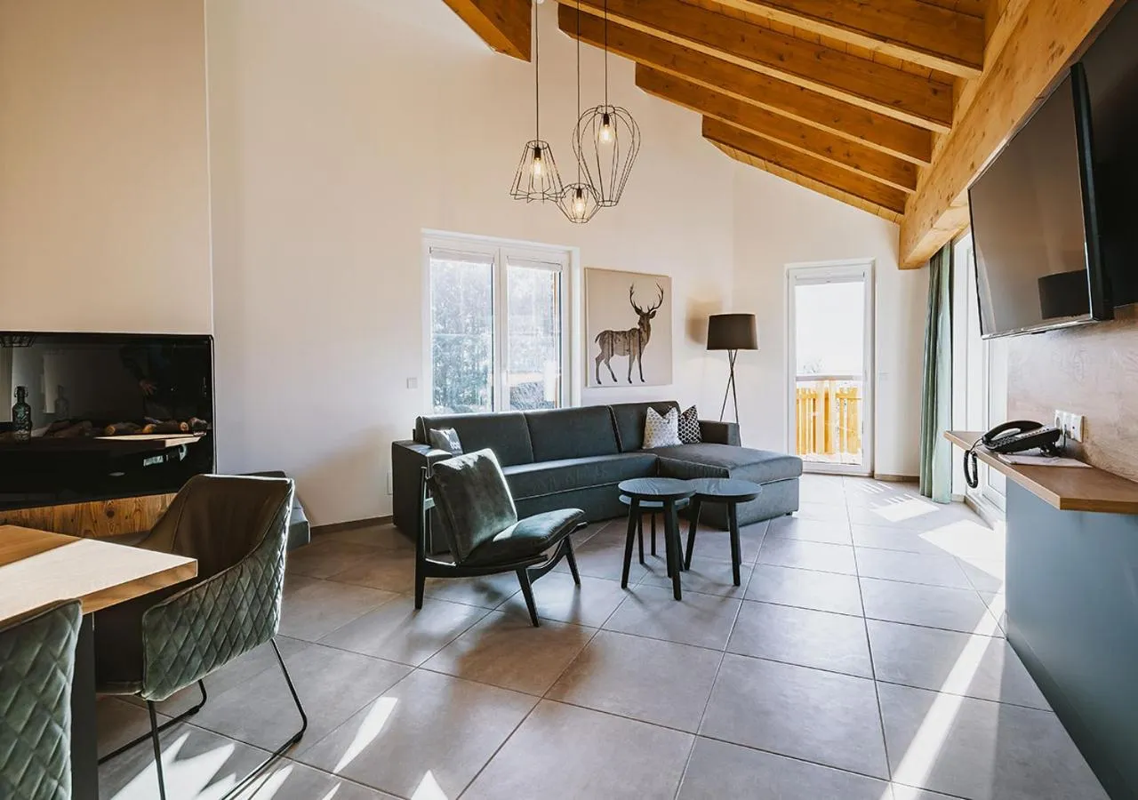 Communal lounge/ TV room in Elements Resort Zell am See BW Signature Collection