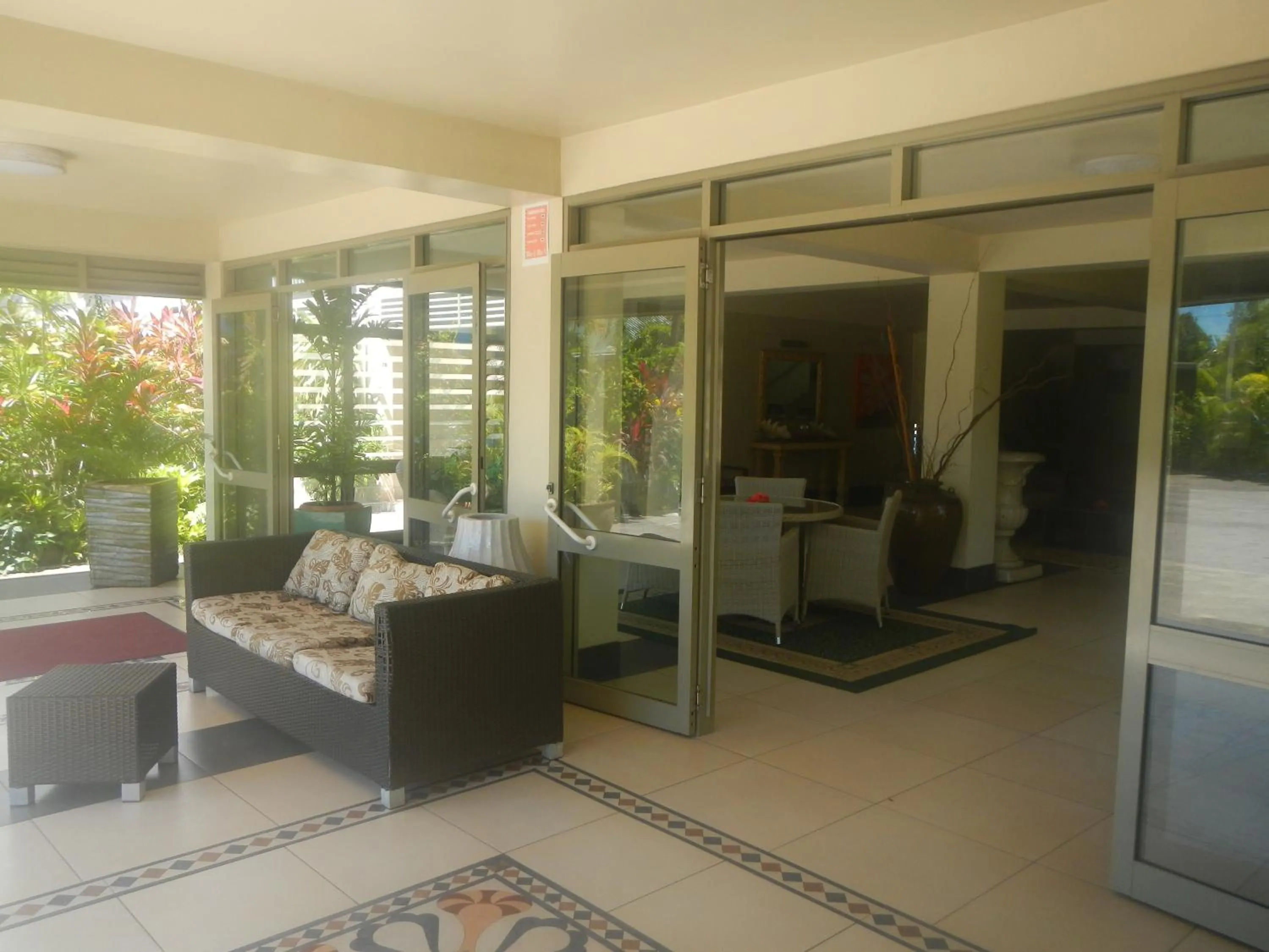 Communal lounge/ TV room in Hotel Millenia Samoa