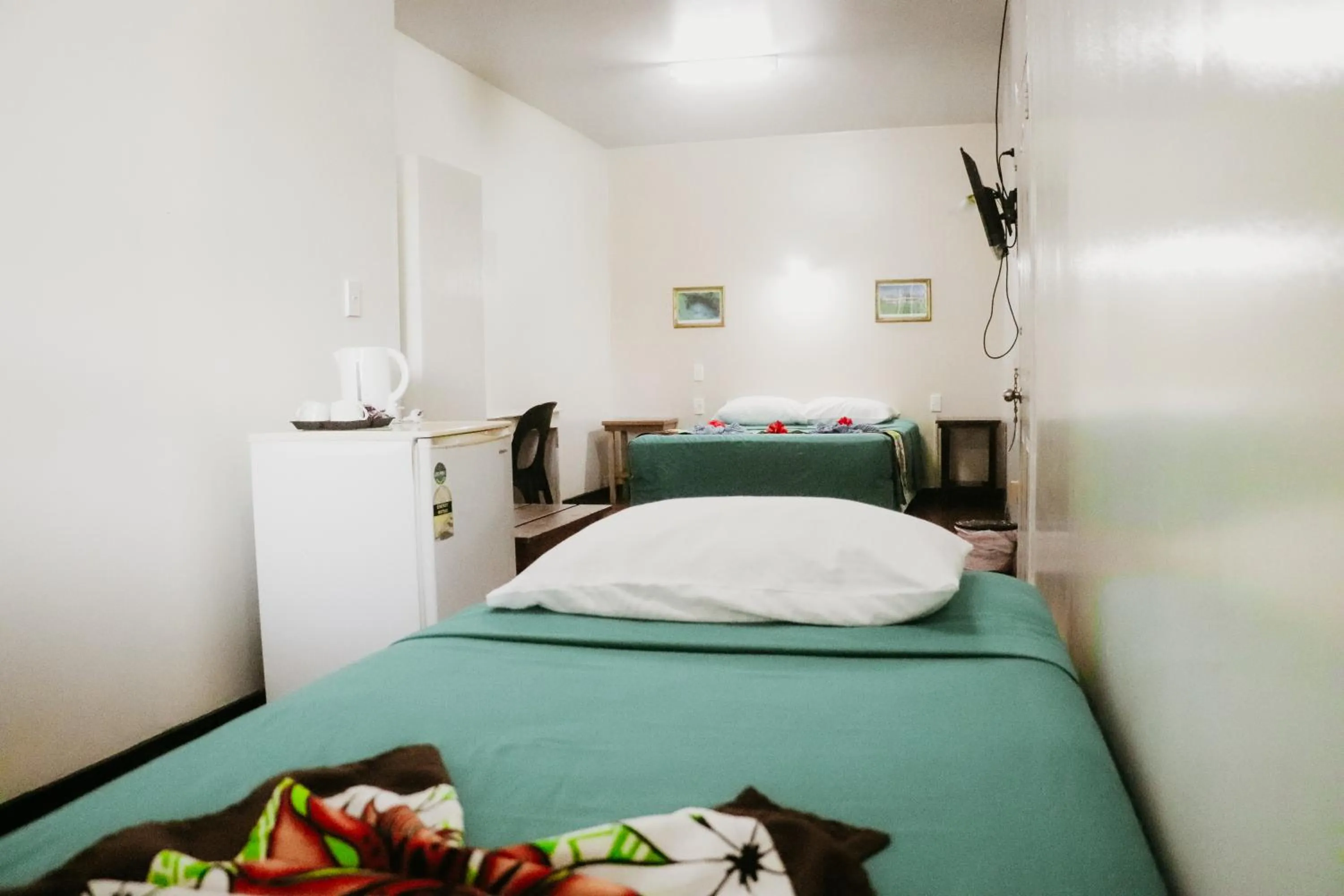 Bed in Hotel Millenia Samoa