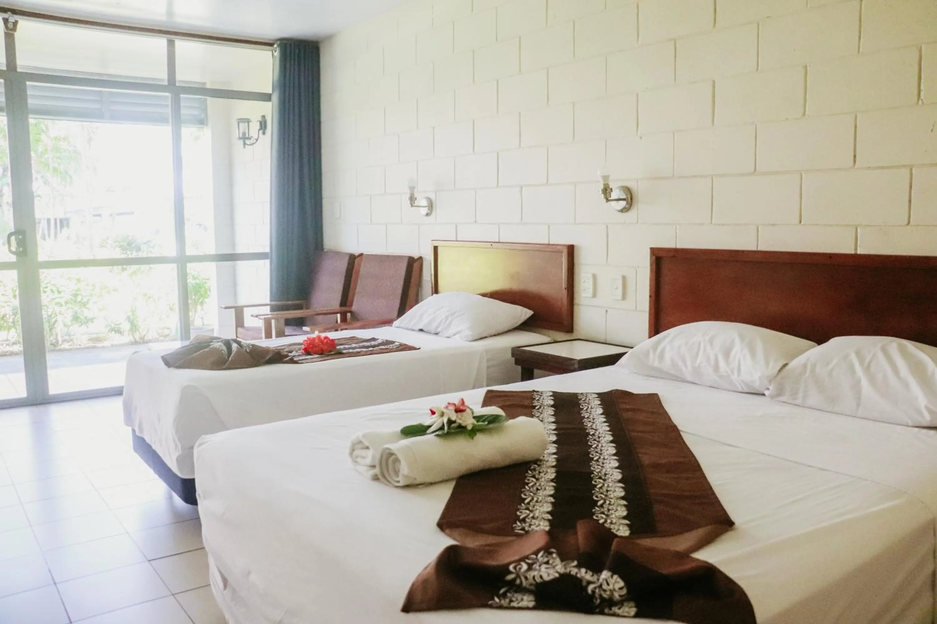 Bed in Hotel Millenia Samoa