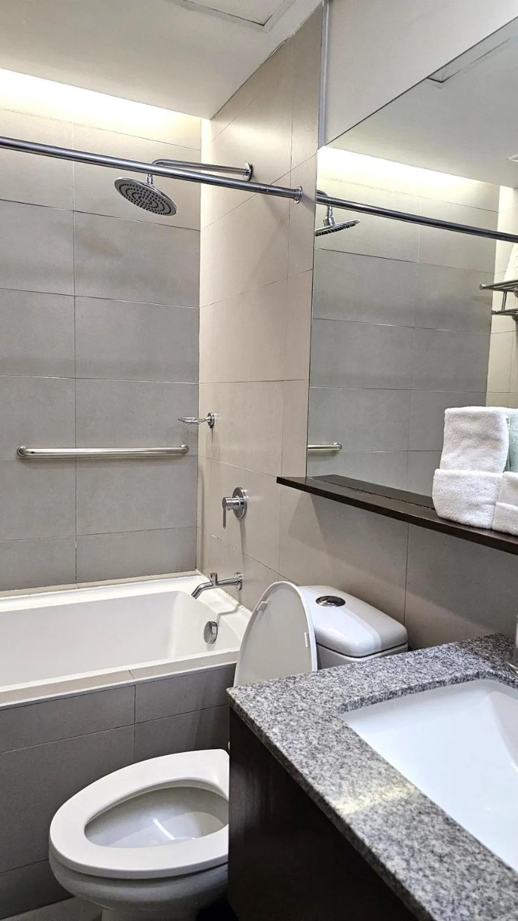 Bathroom in Microtel by Wyndham Acropolis