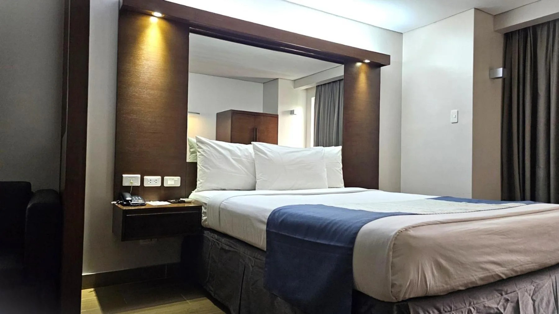 Bed in Microtel by Wyndham Acropolis