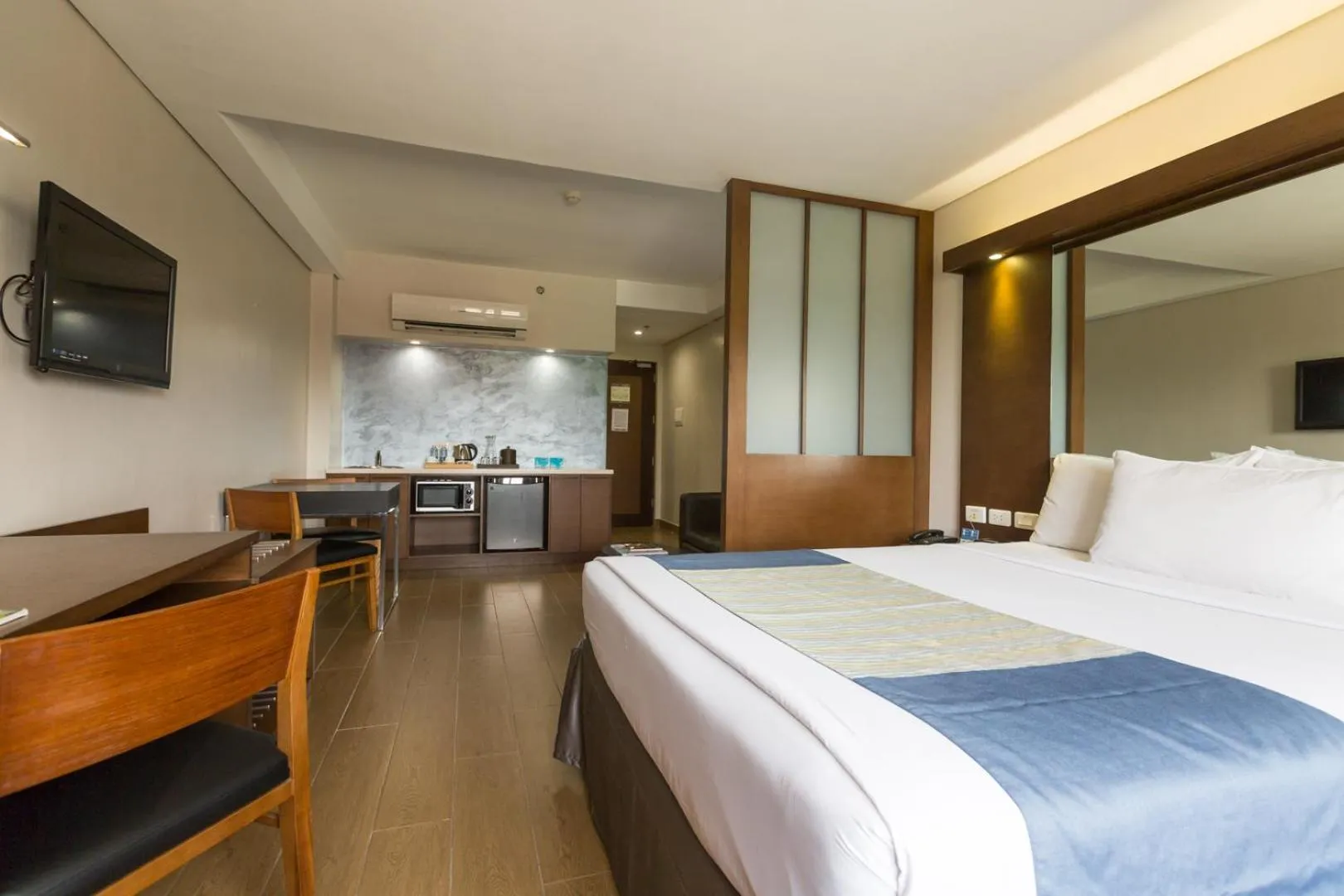 Bedroom, Bed in Microtel by Wyndham Acropolis