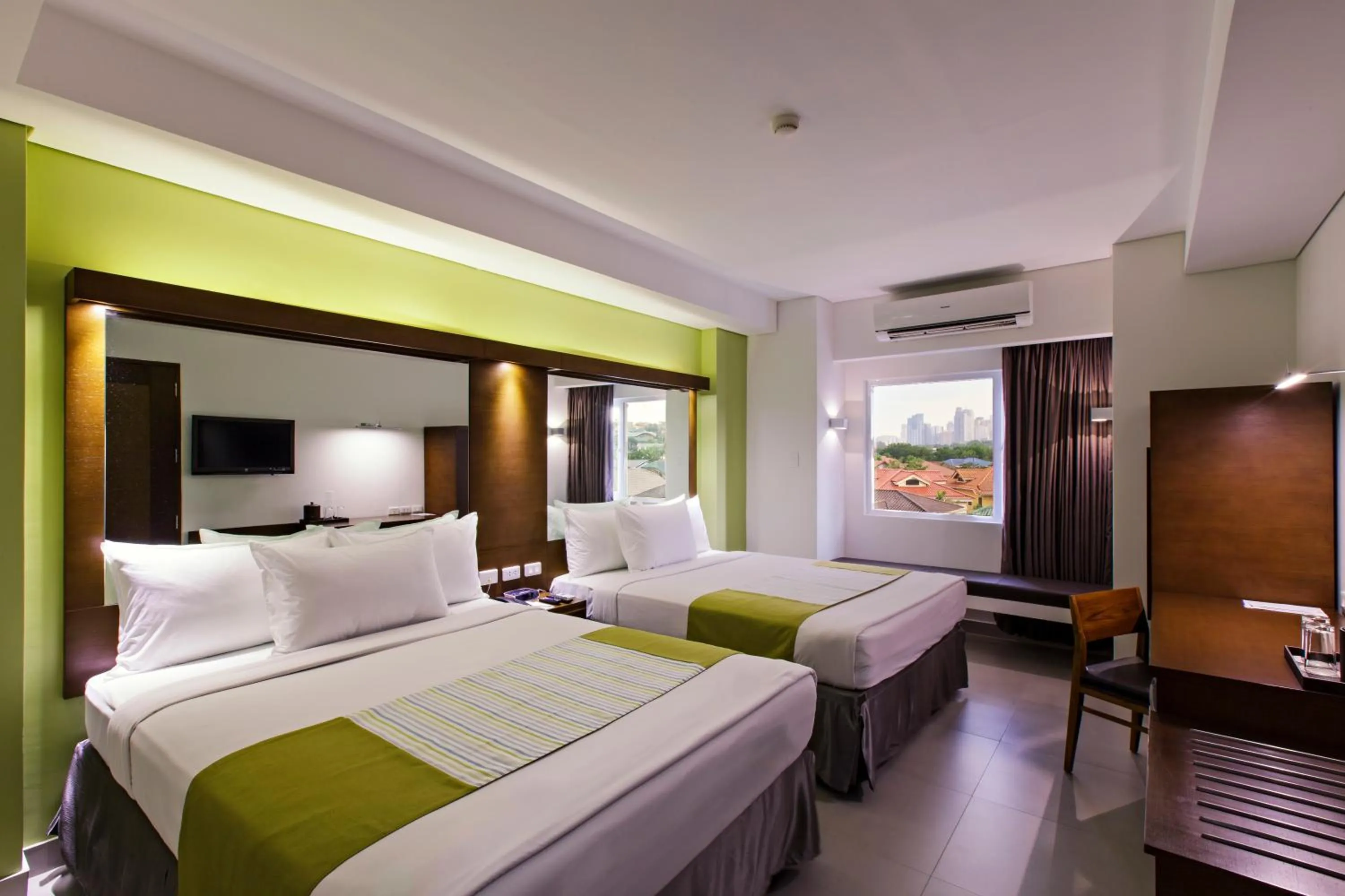 Bed in Microtel by Wyndham Acropolis