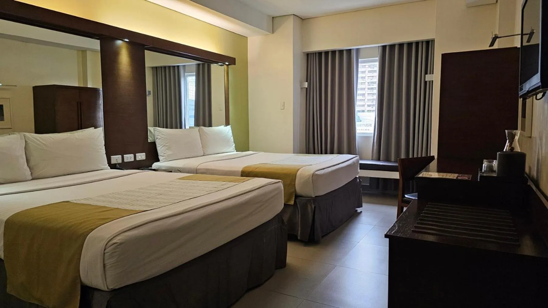 Bed in Microtel by Wyndham Acropolis