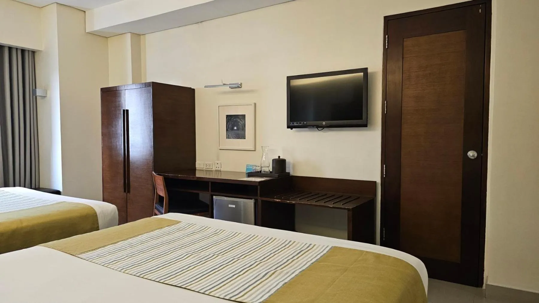 Bed in Microtel by Wyndham Acropolis