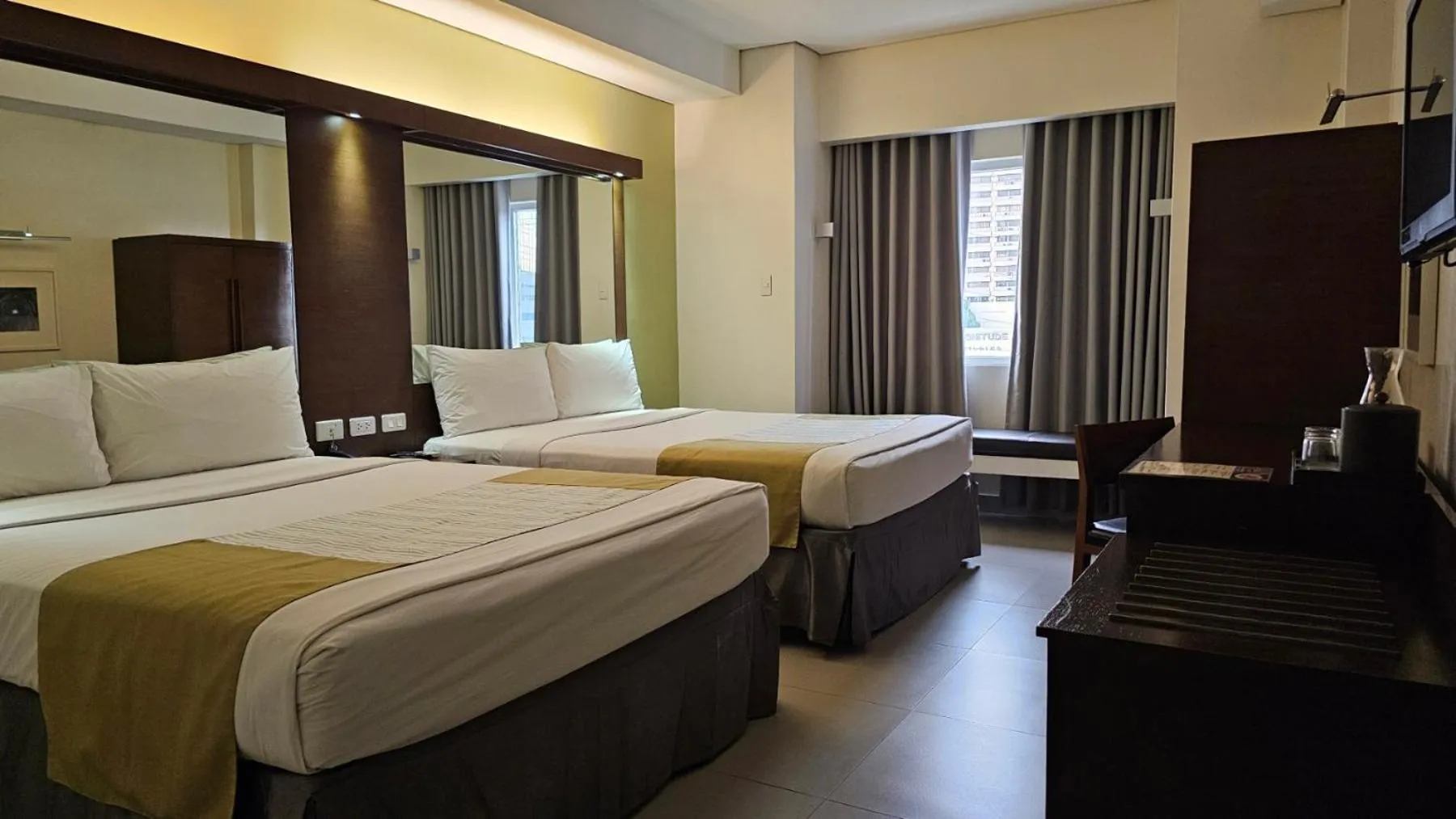 Bed in Microtel by Wyndham Acropolis