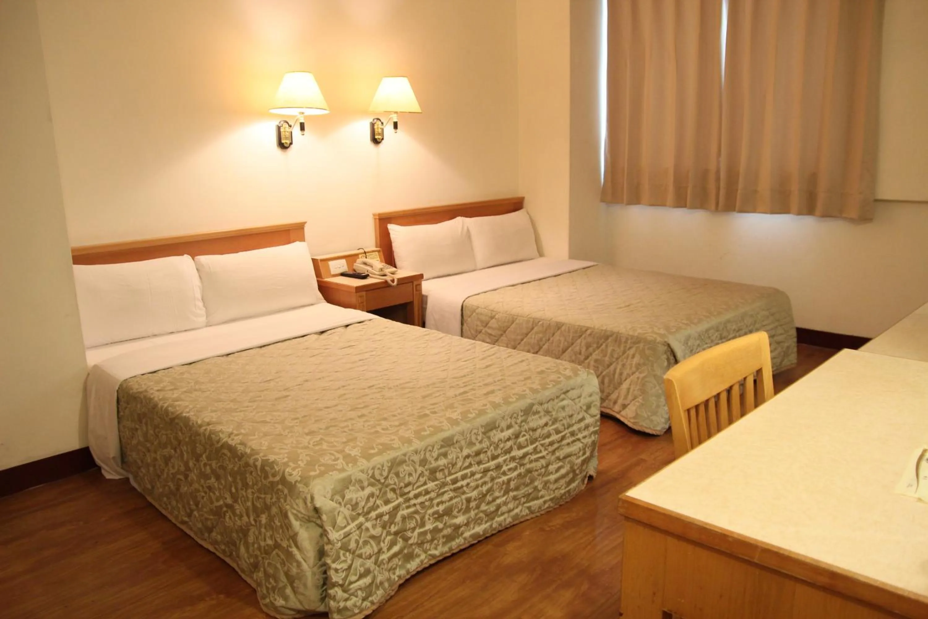 Photo of the whole room, Bed in 金馬大飯店 Riverside Hotel