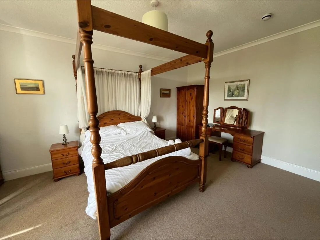 Bed in Trimstone Manor Hotel