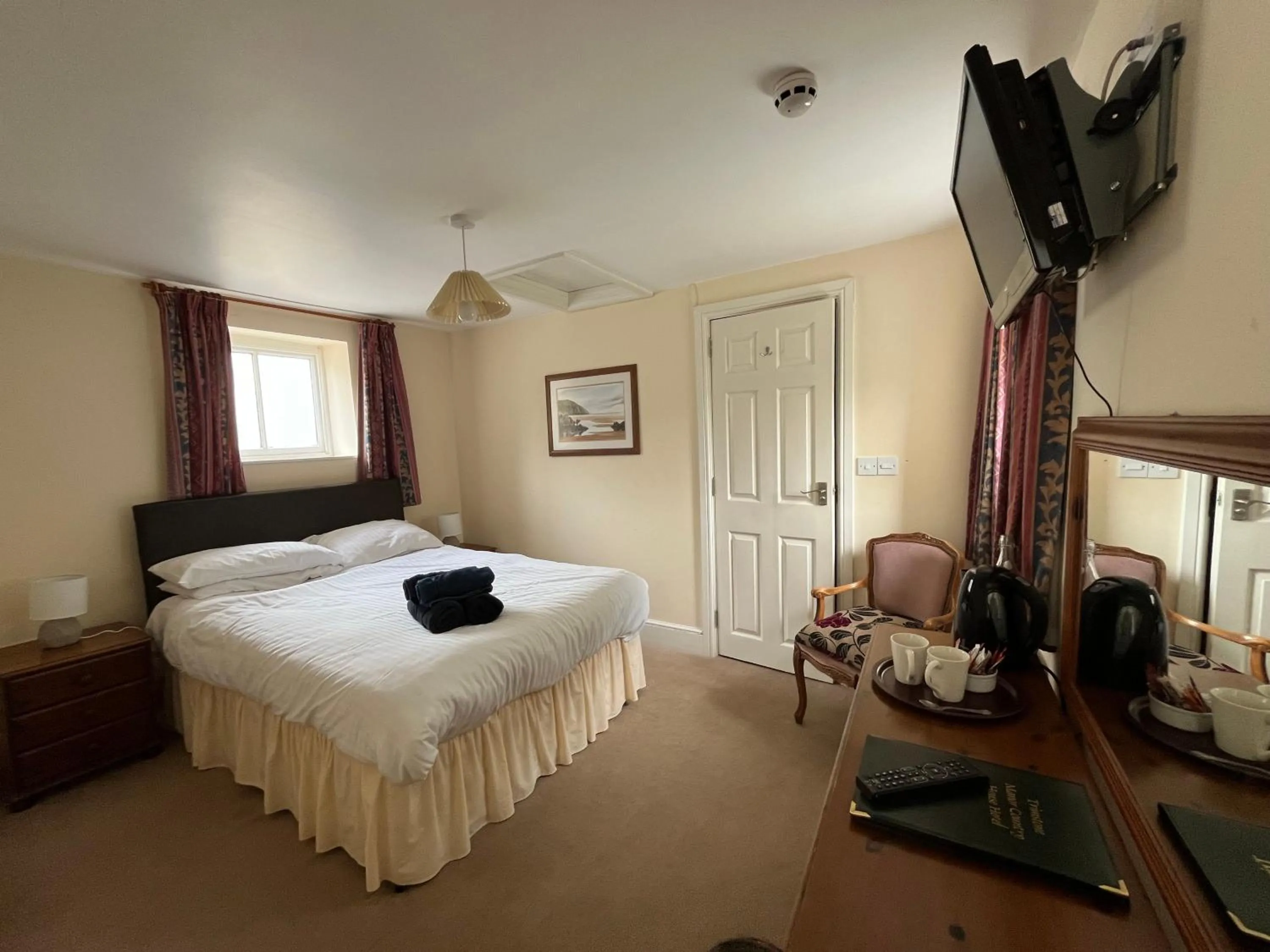 Bed in Trimstone Manor Hotel