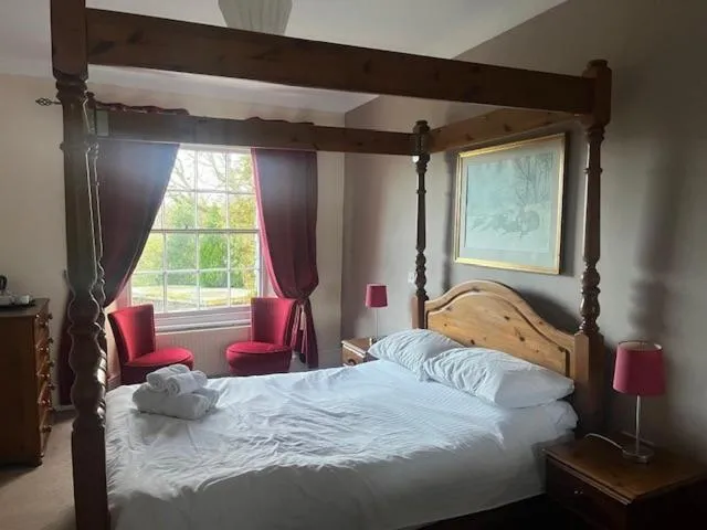 Bed in Trimstone Manor Hotel