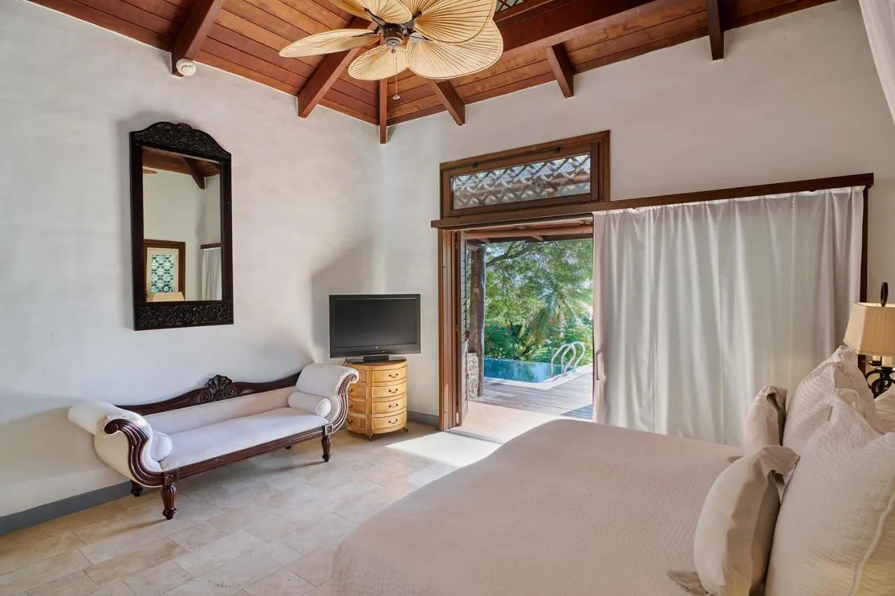 Bed in Canouan Estate Resort & Villas