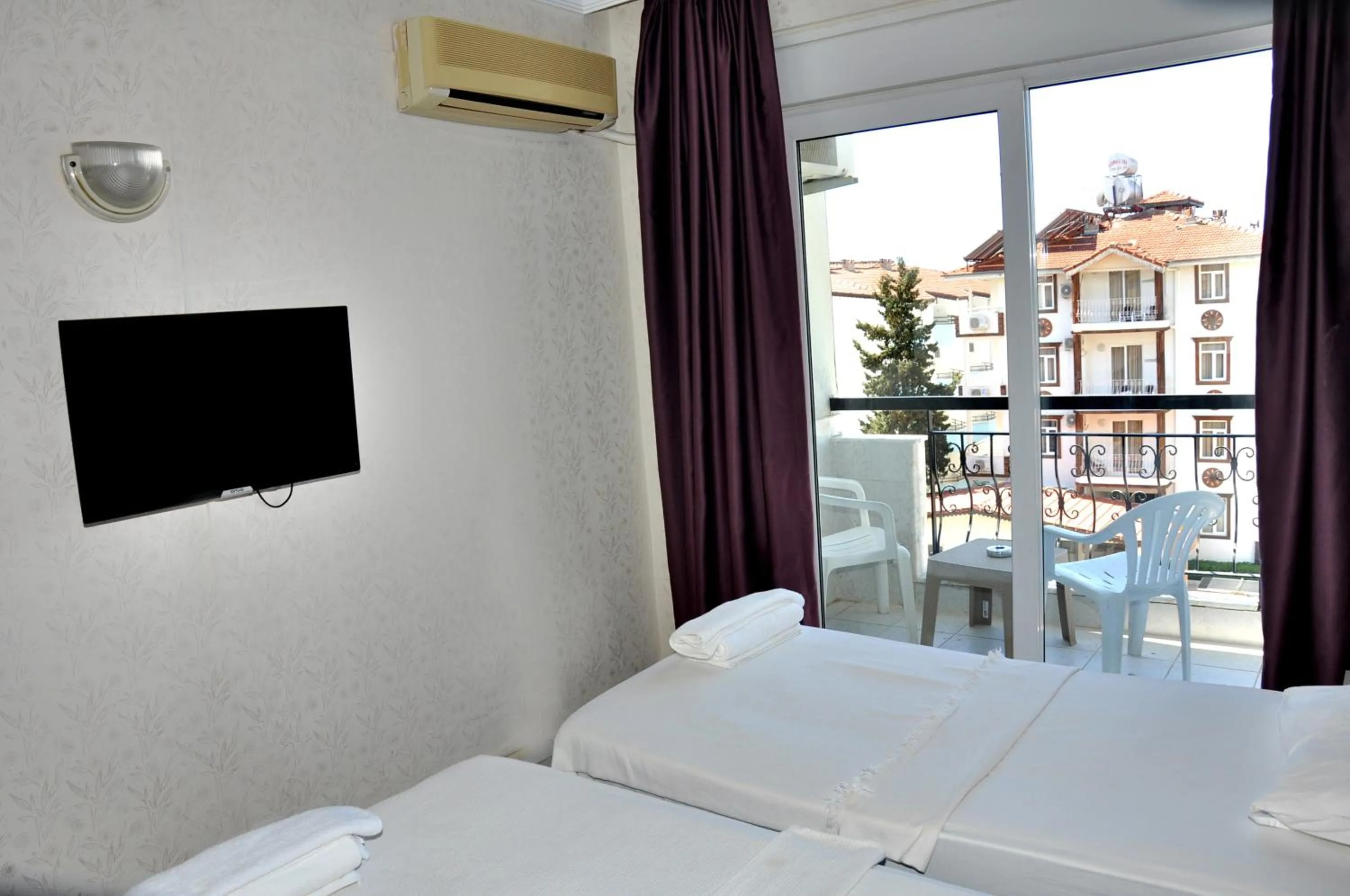 Bed in Saygılı Beach Hotel
