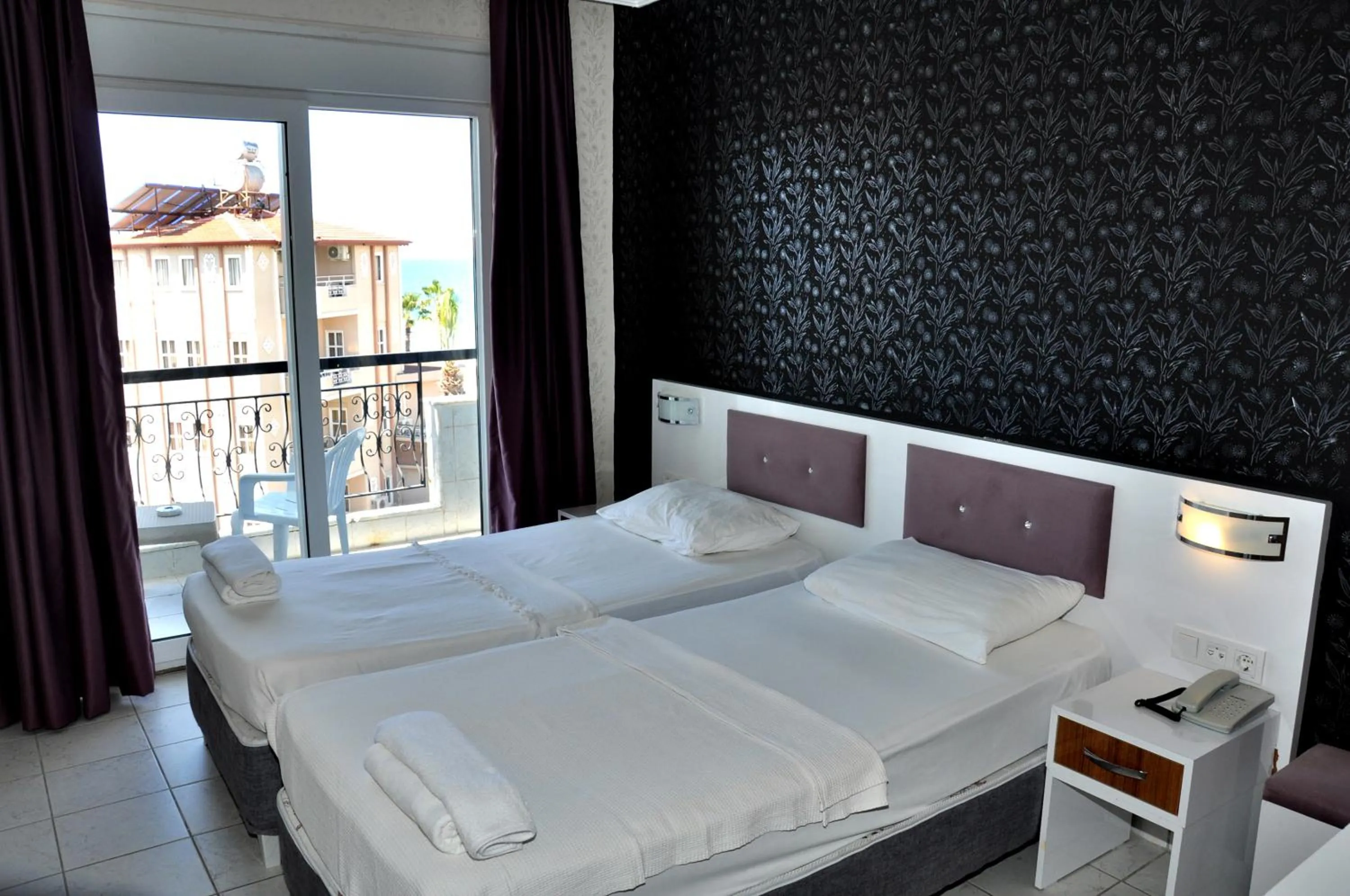 Bed in Saygılı Beach Hotel