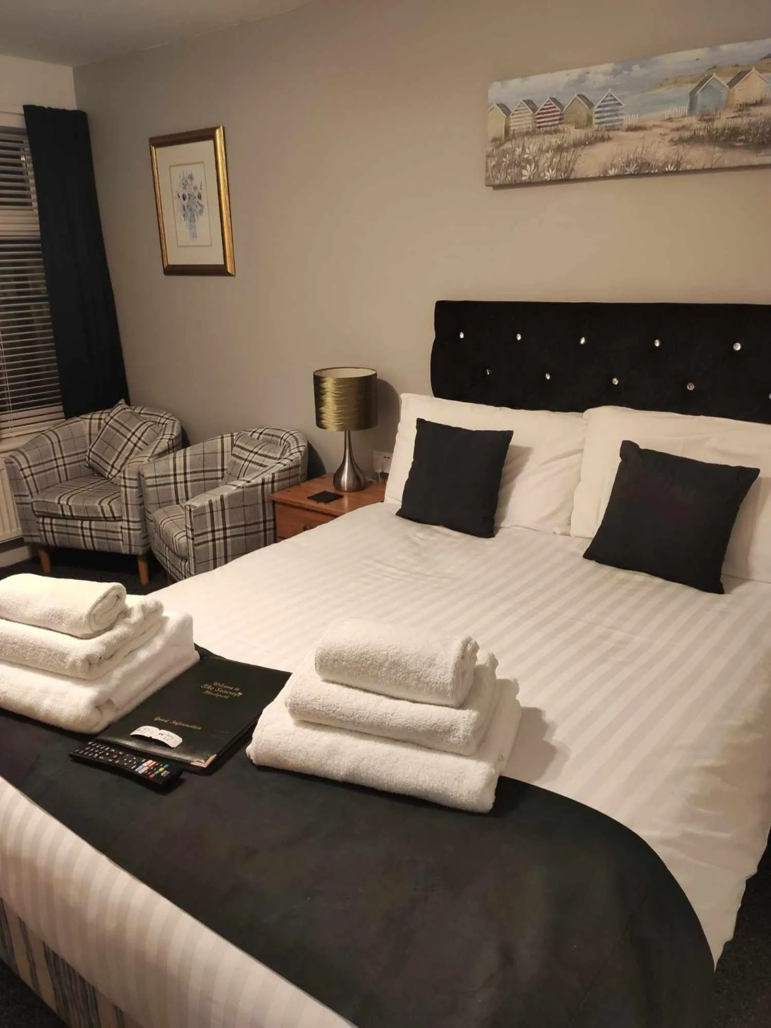 Bed in Q Accommodation