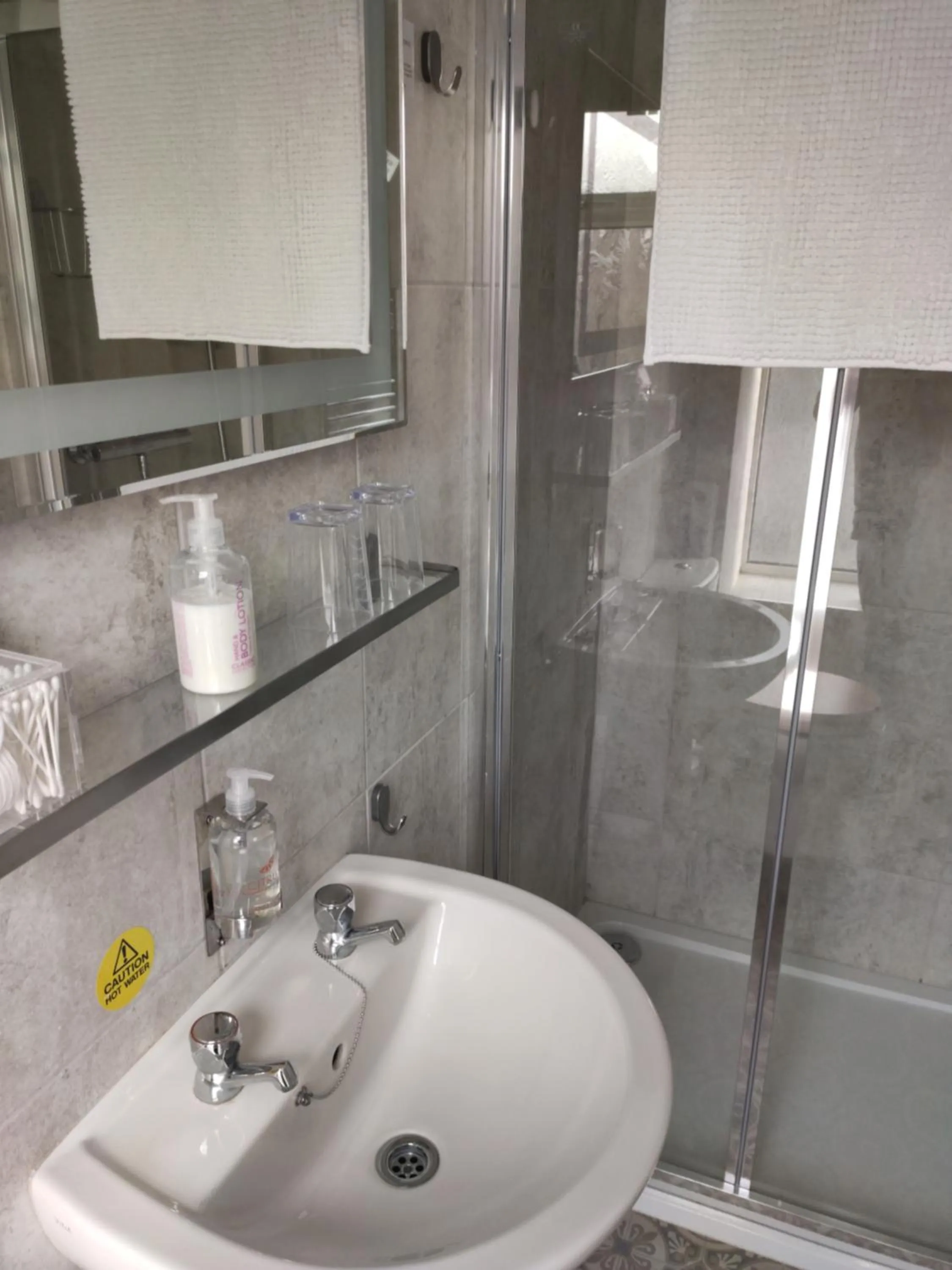 Shower in Q Accommodation