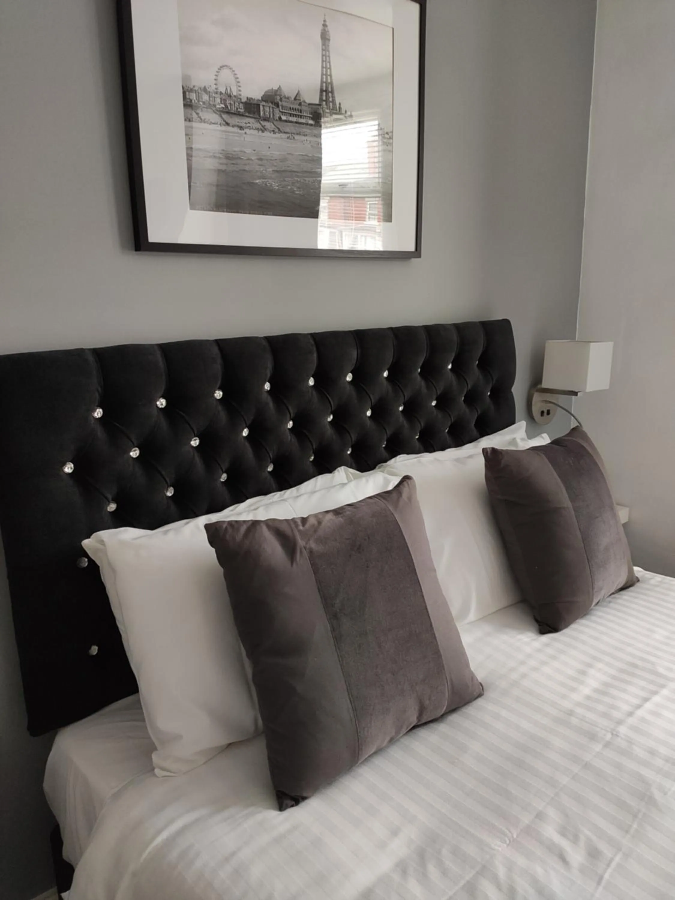 Bed in Q Accommodation