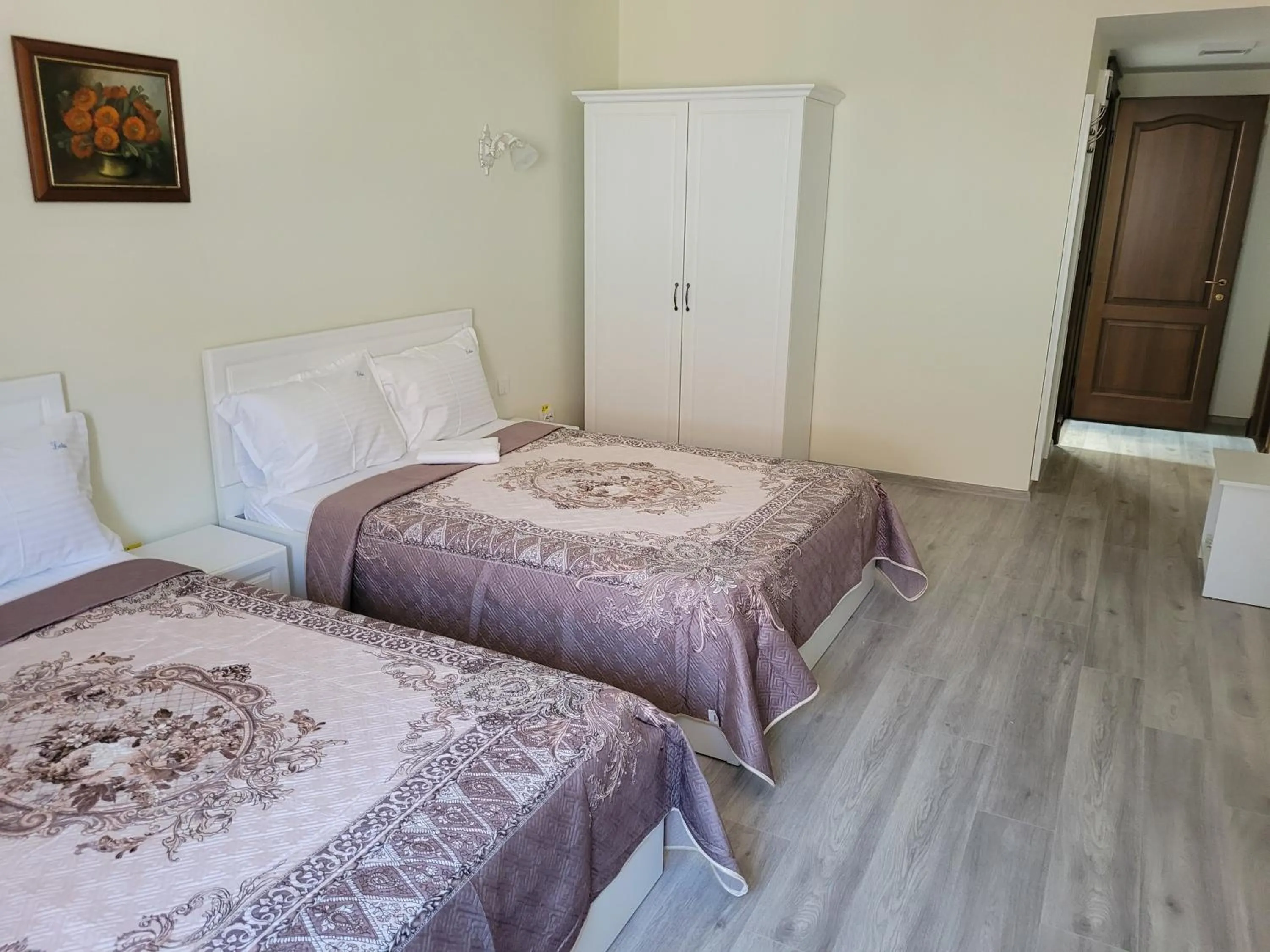 Photo of the whole room, Bed in LOTUS Boutique