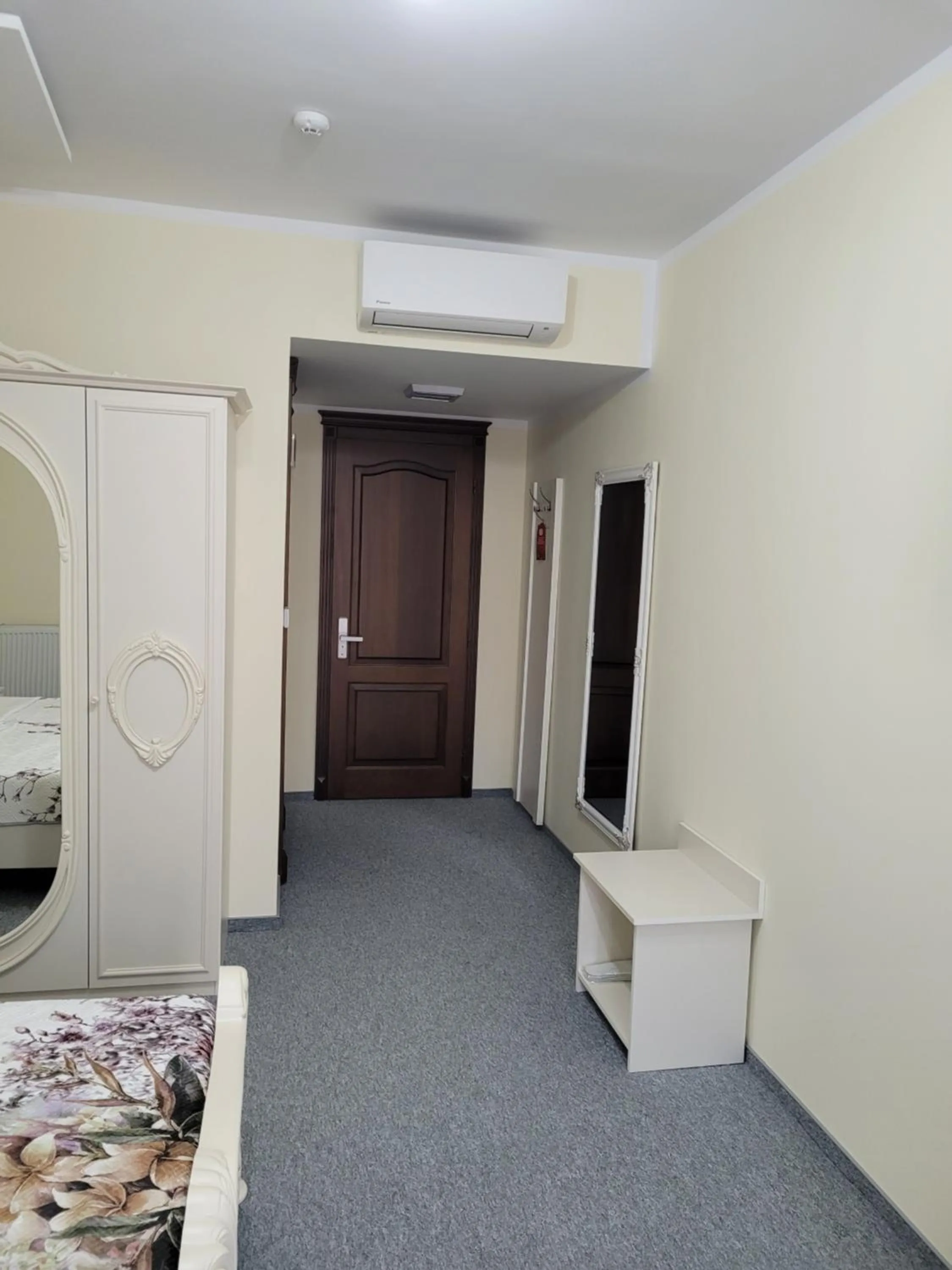 Seating area, Bed in LOTUS Boutique