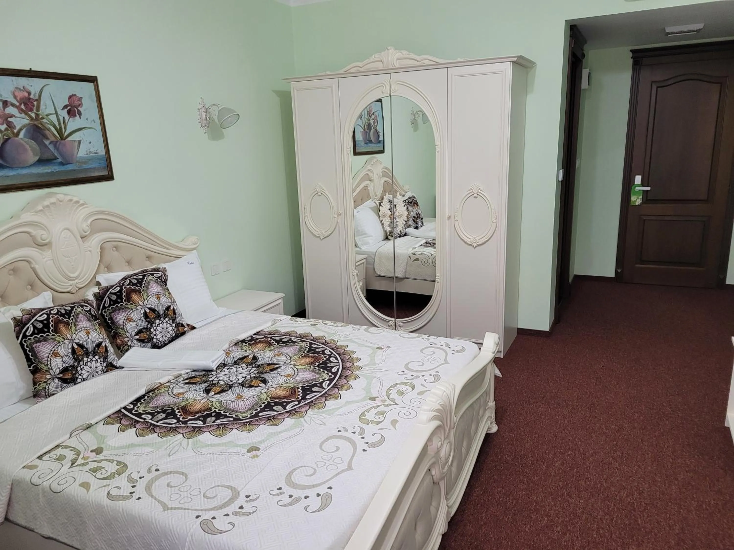 Photo of the whole room, Bed in LOTUS Boutique