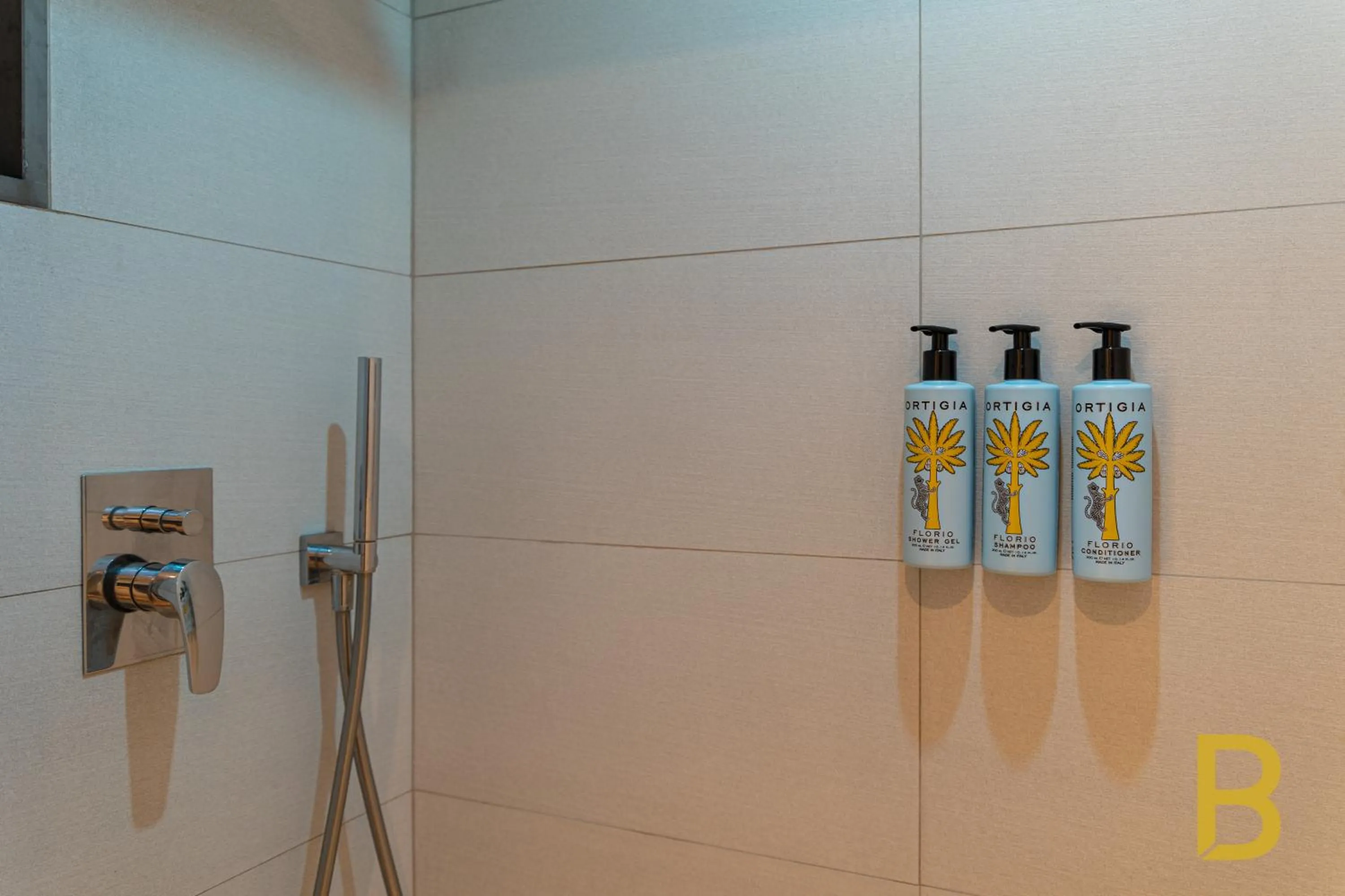 Shower in BePlace Garibaldi Suites