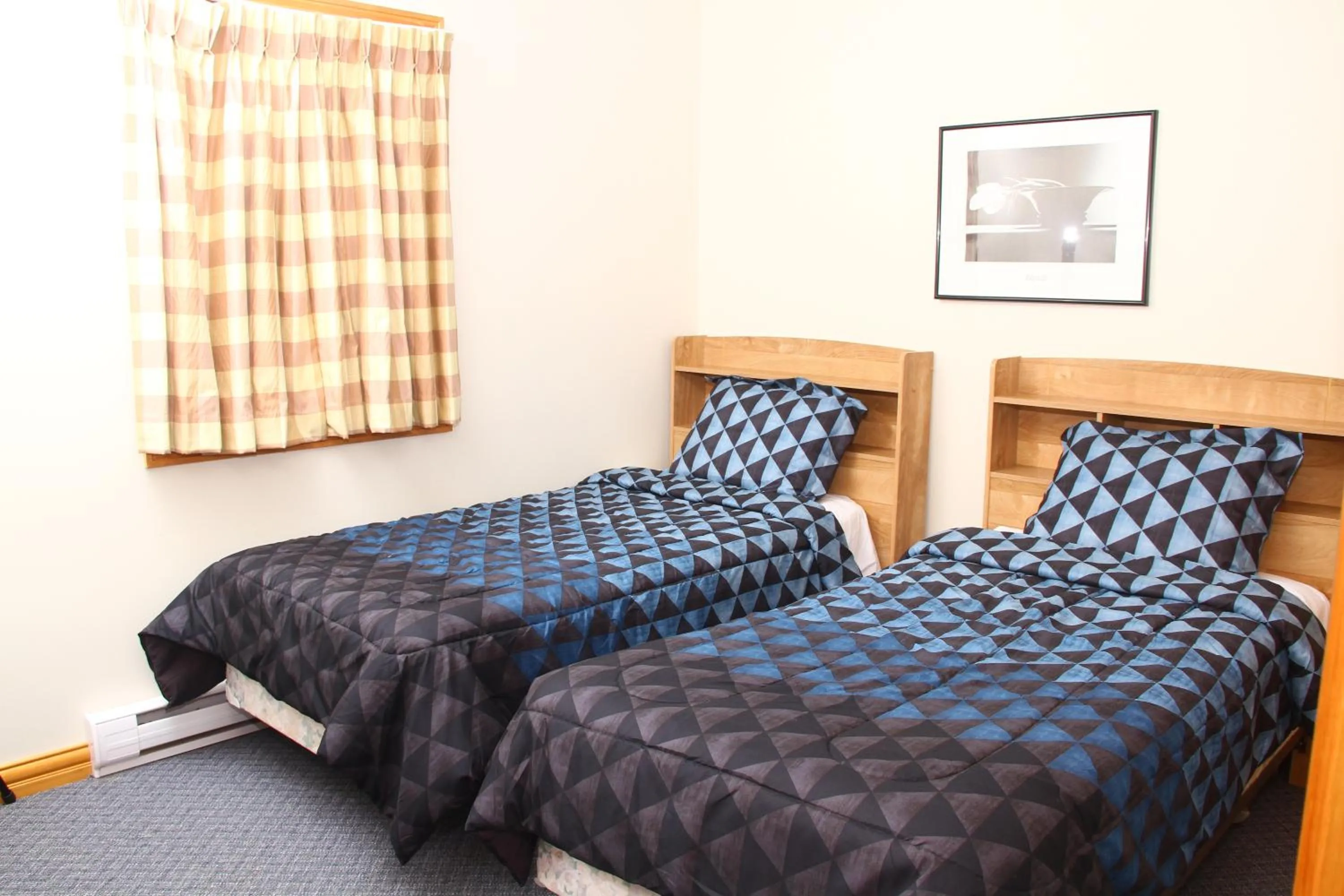 Bed in By the Bay Cottages