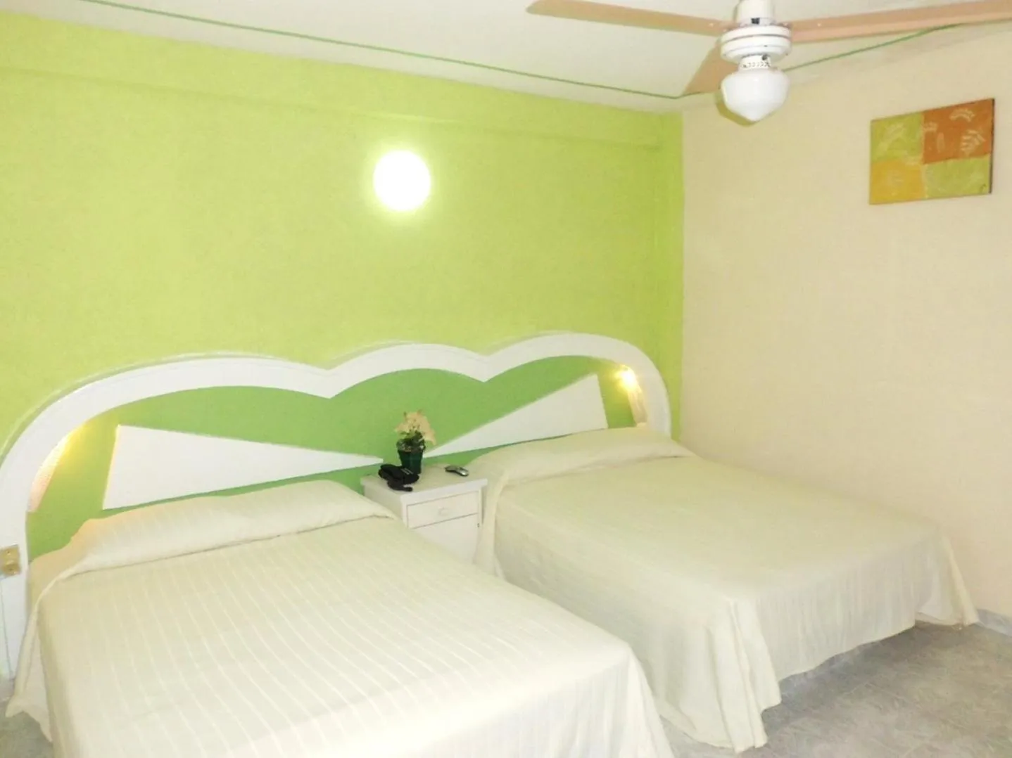 Decorative detail, Bed in Suites Angelopolis