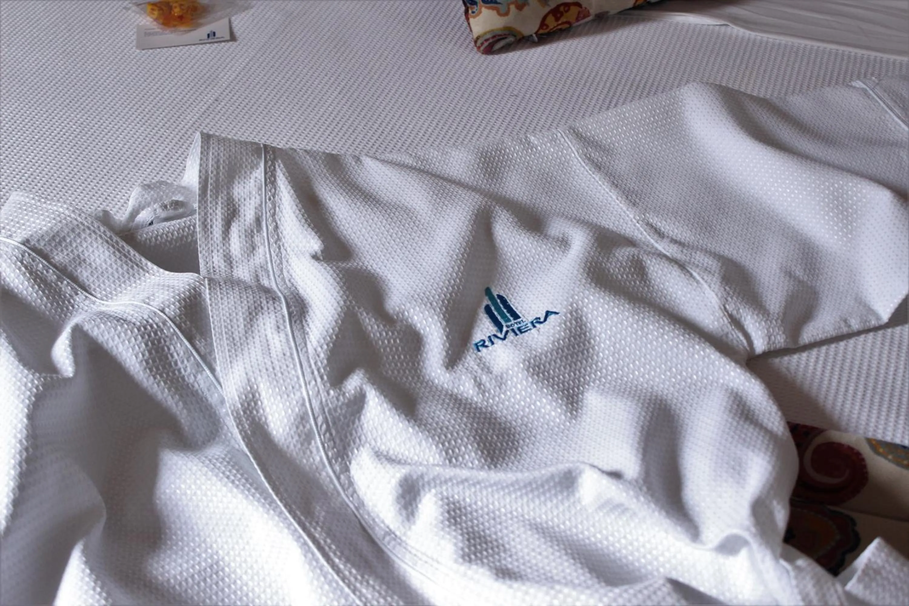 Bed in Hotel Riviera