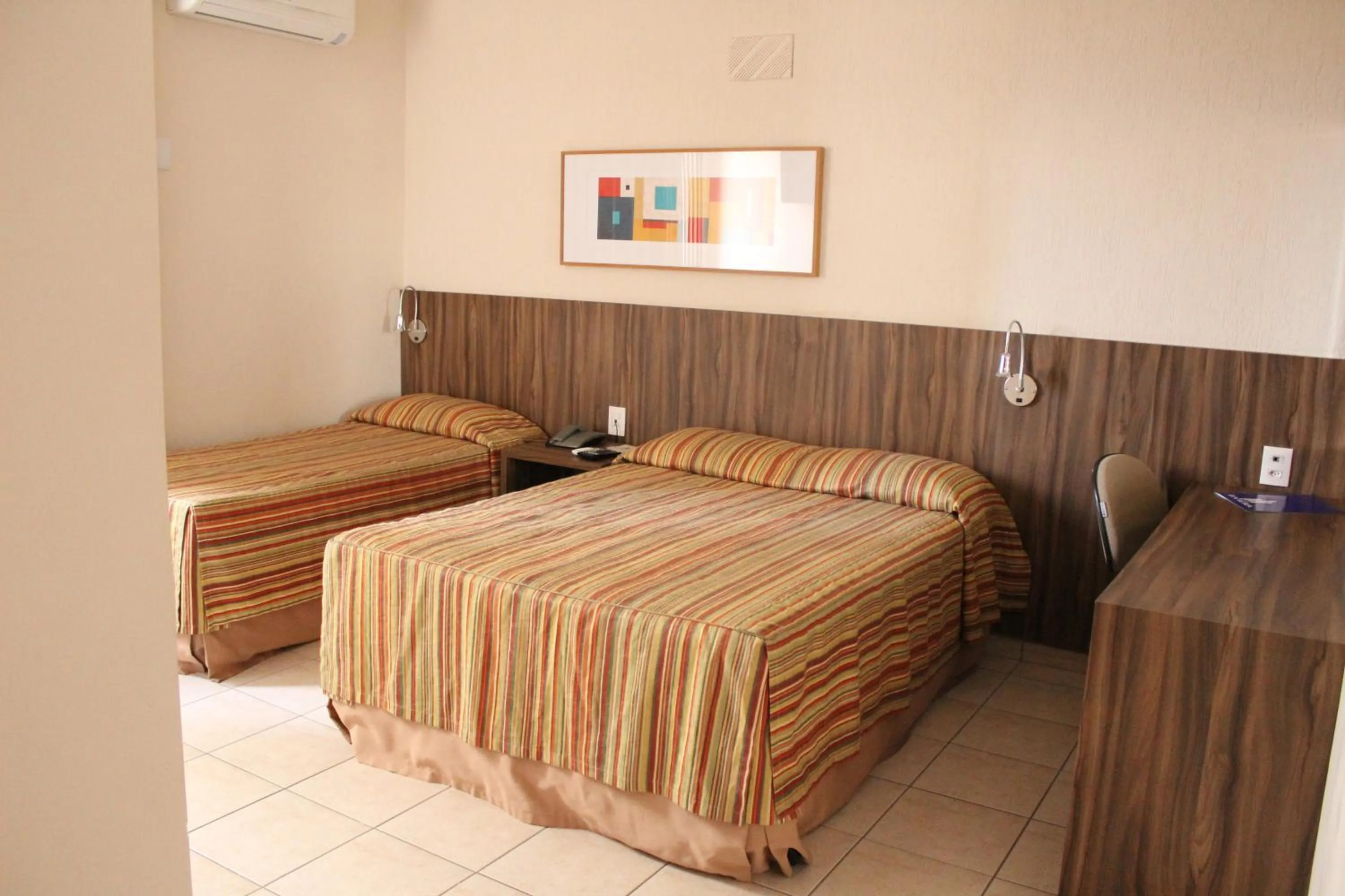 Bed in Hotel Riviera