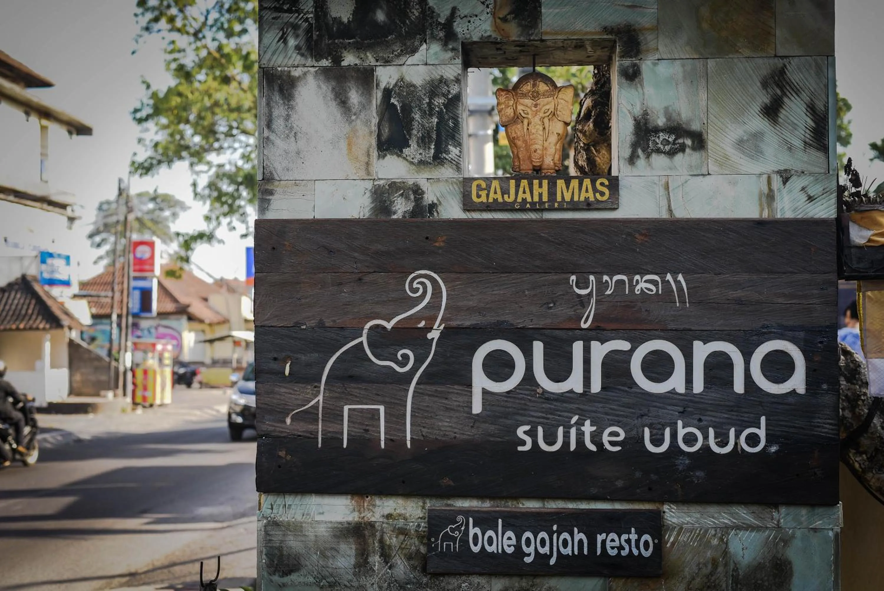 Property logo or sign in Purana Suite Ubud
