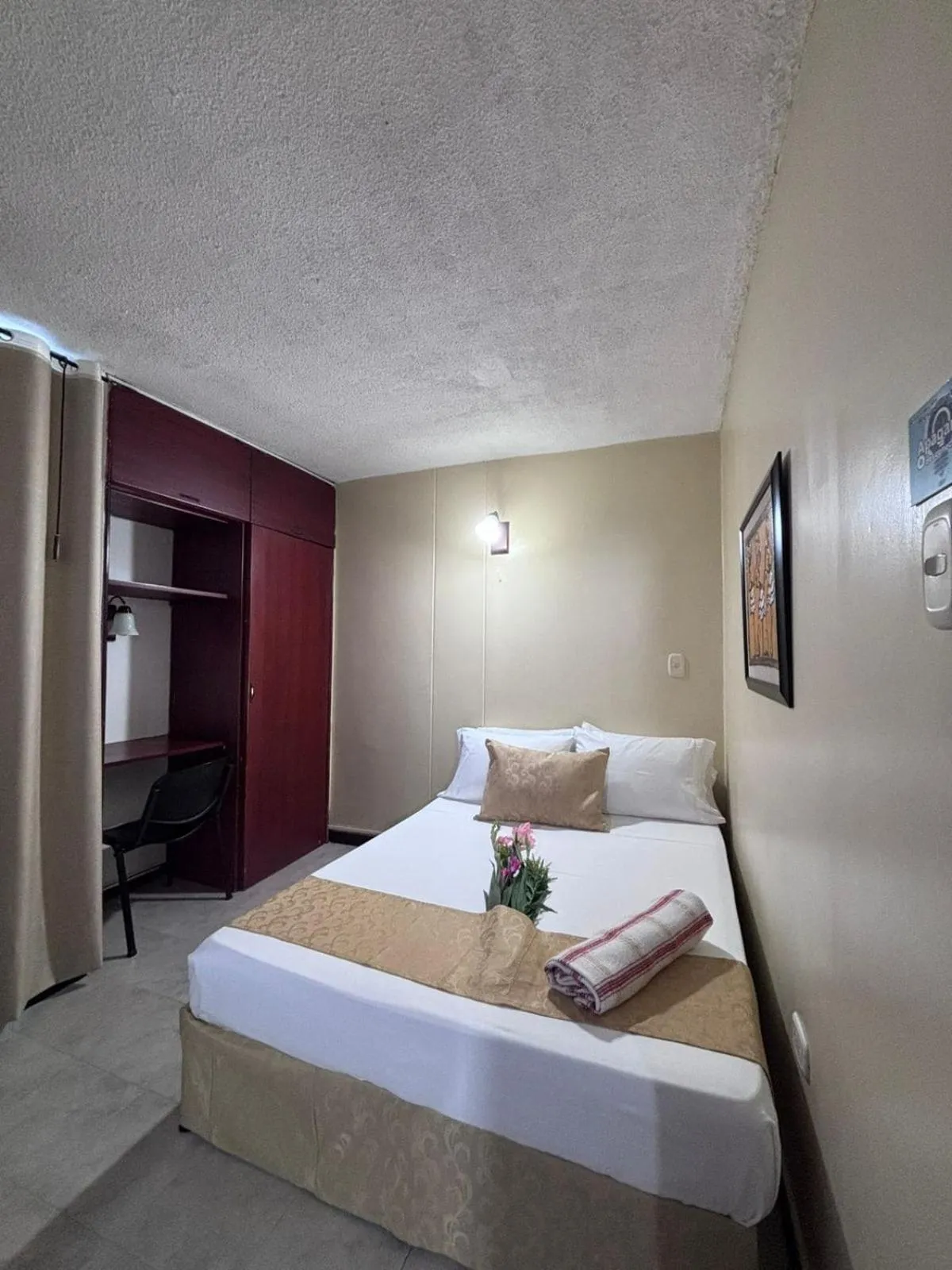 Bed in Hotel Tumburagua Soin Sas