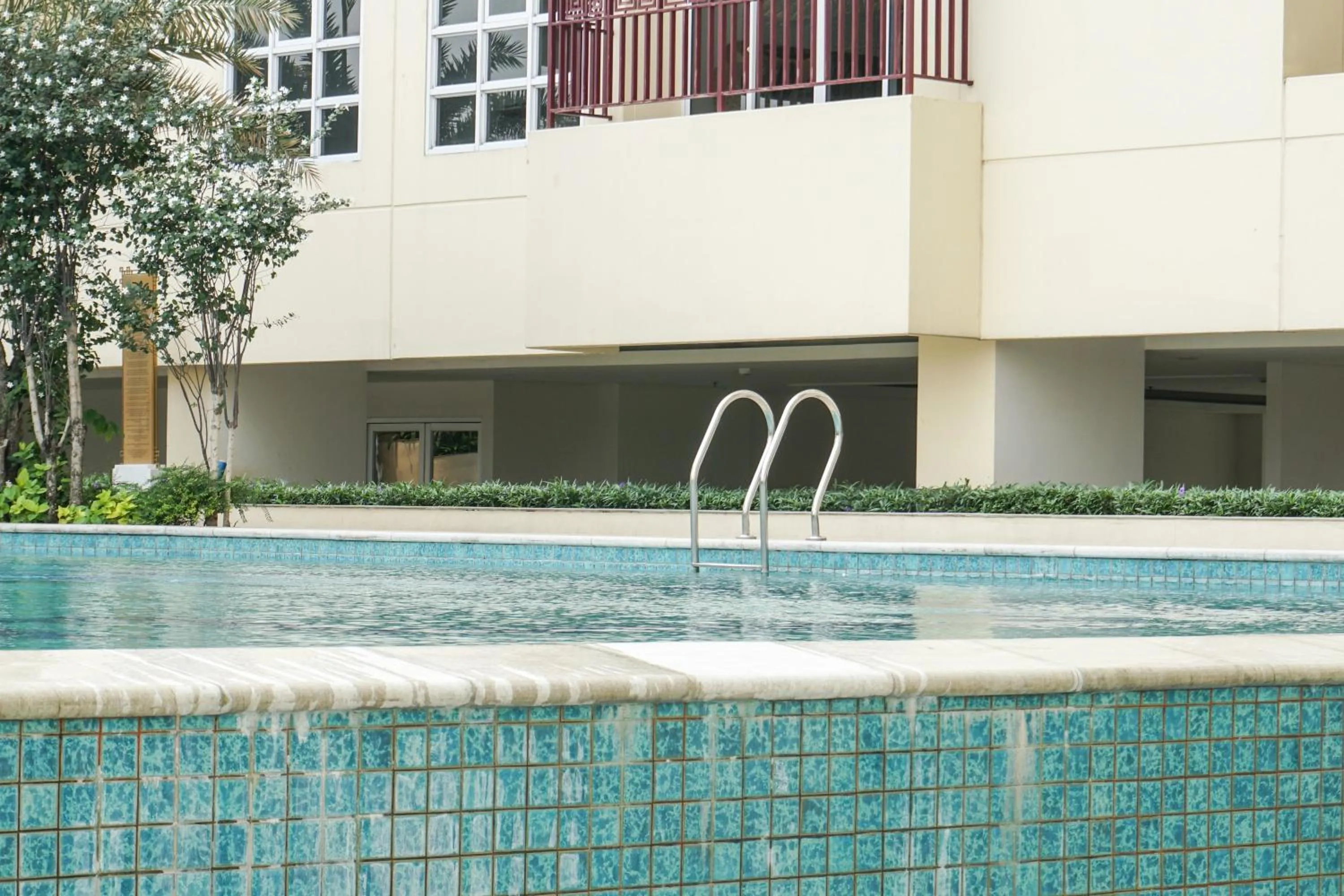 Property building in Fabulous 2BR Apartment Lucky Tower Residence By Travelio