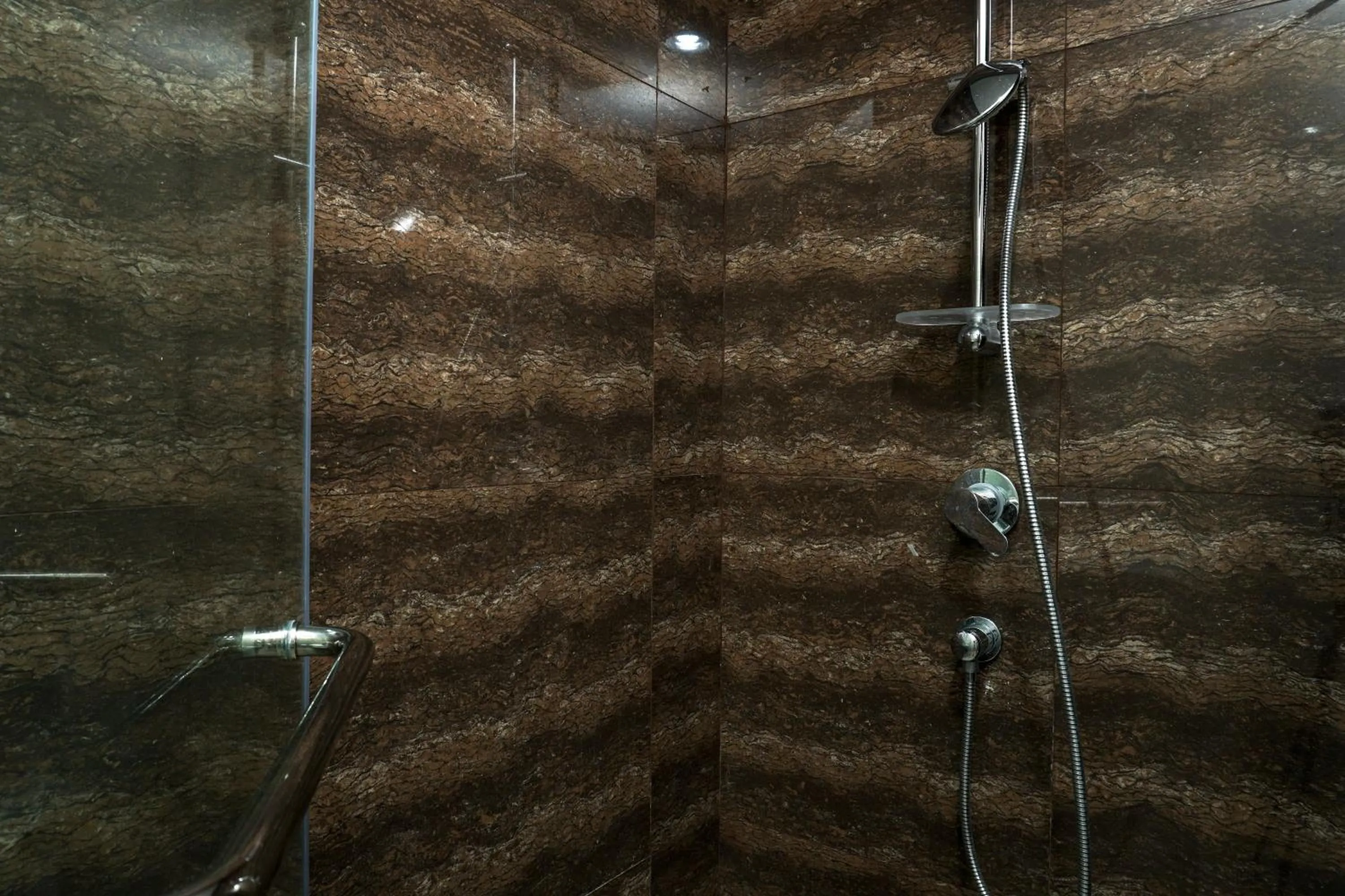 Bathroom in Fabulous 2BR Apartment Lucky Tower Residence By Travelio