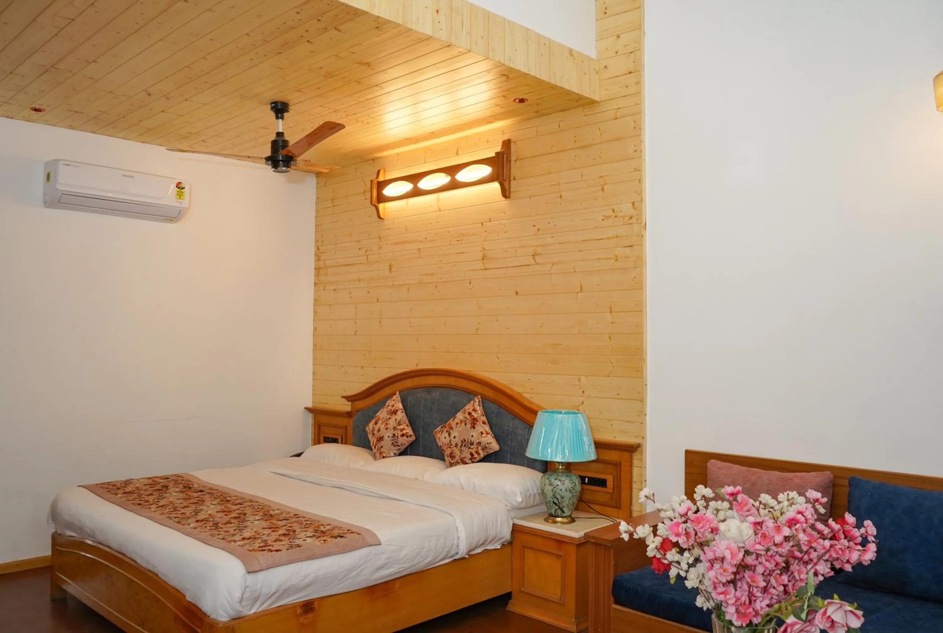 Photo of the whole room, Bed in Neelesh Inn- A Luxury Lake View Hotel- 20 kms from Nainital