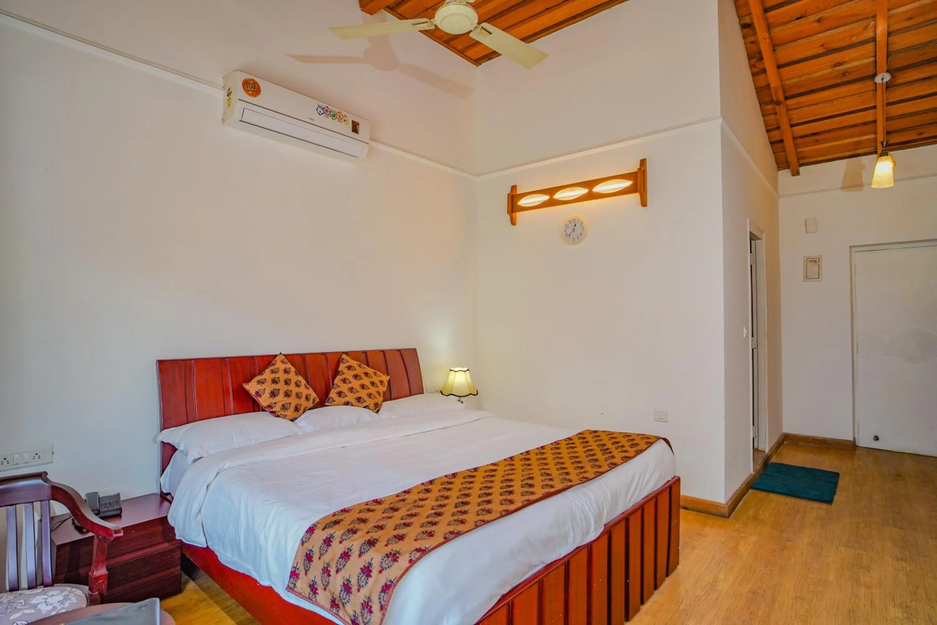 Photo of the whole room, Bed in Neelesh Inn- A Luxury Lake View Hotel- 20 kms from Nainital