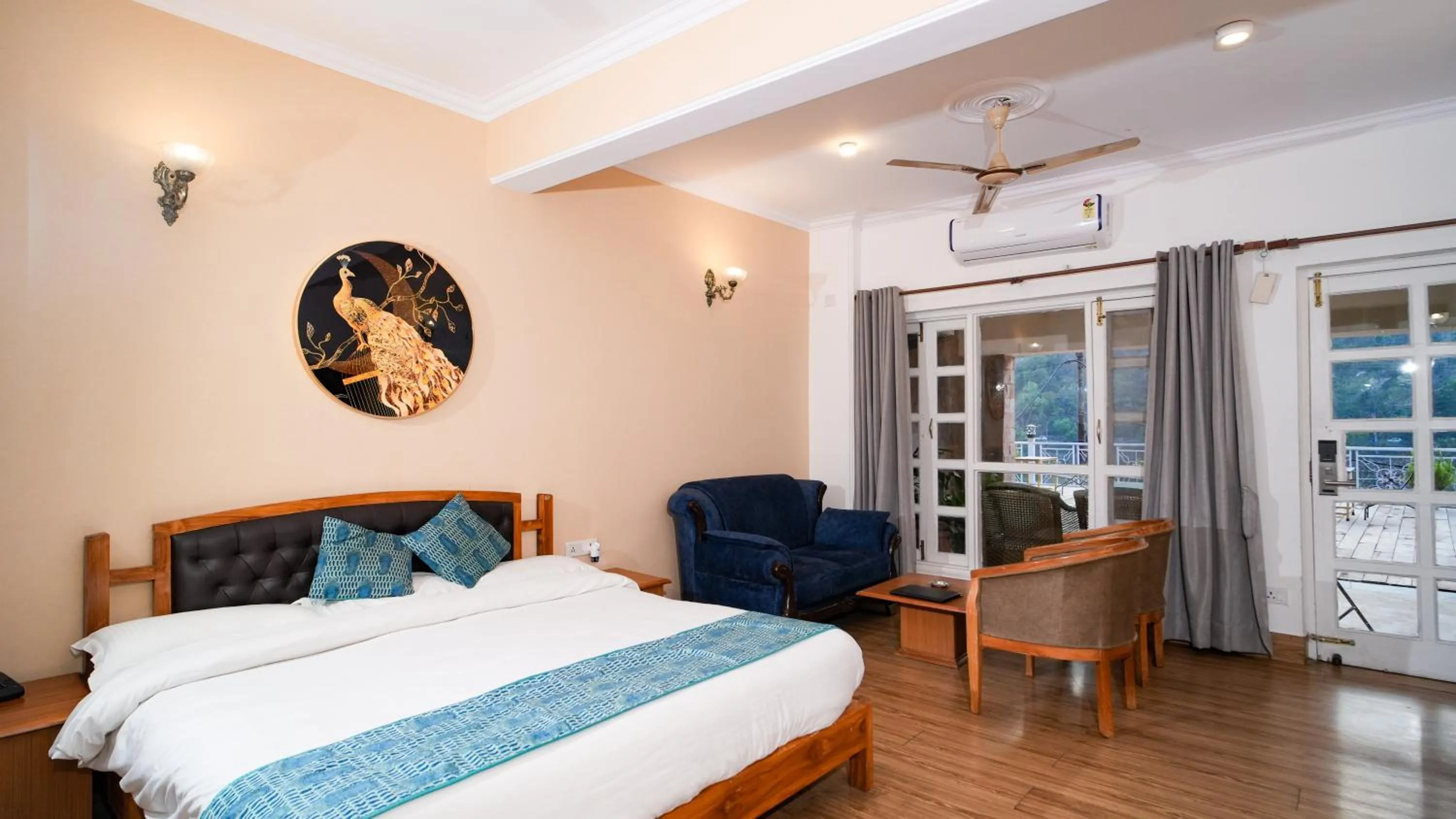 Photo of the whole room, Bed in Neelesh Inn- A Luxury Lake View Hotel- 20 kms from Nainital