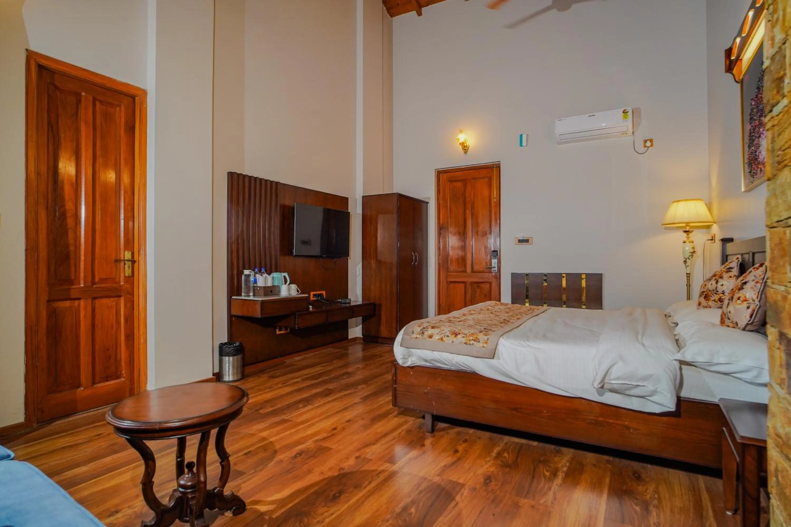 Seating area, Bed in Neelesh Inn- A Luxury Lake View Hotel- 20 kms from Nainital