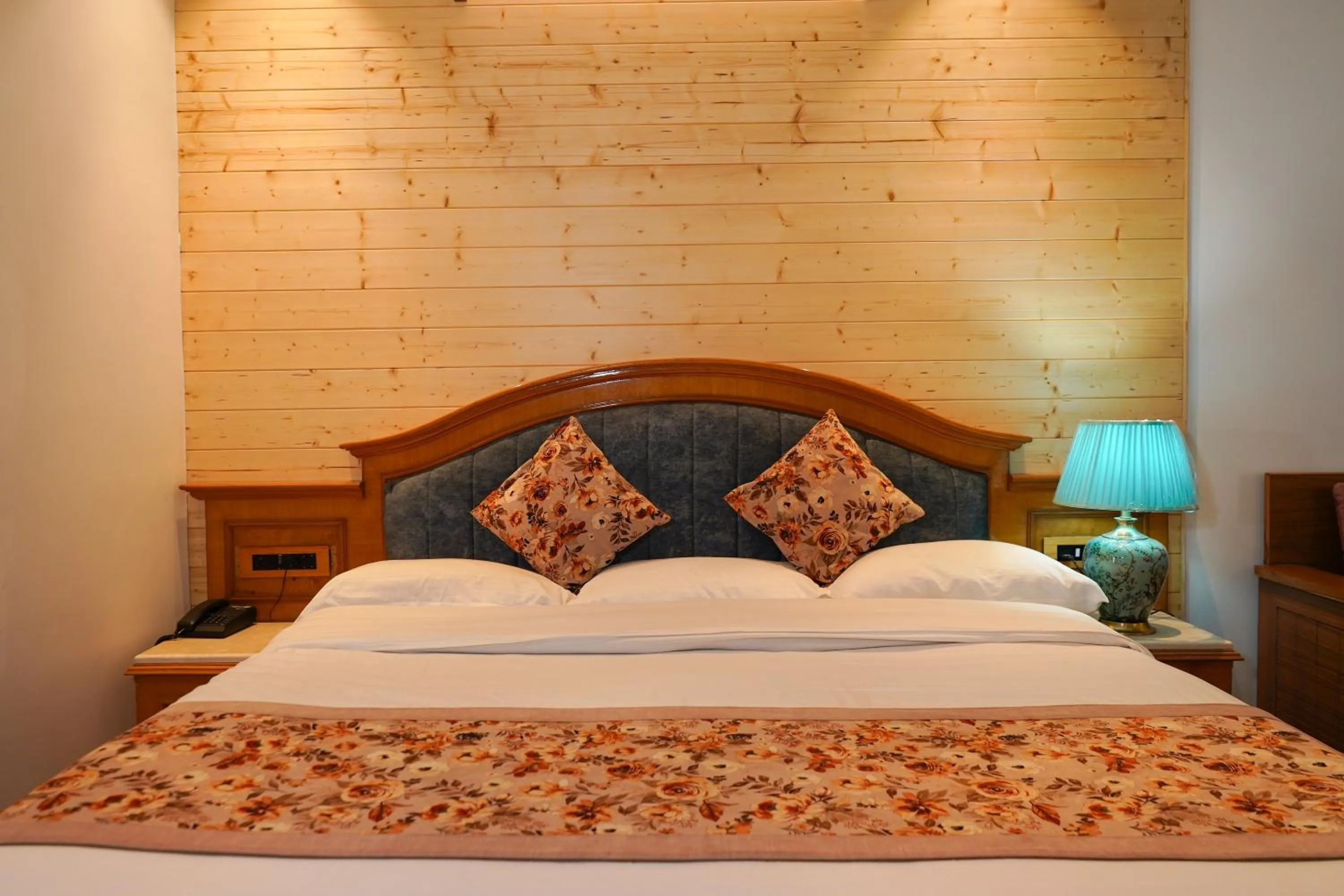 Bed in Neelesh Inn- A Luxury Lake View Hotel- 20 kms from Nainital