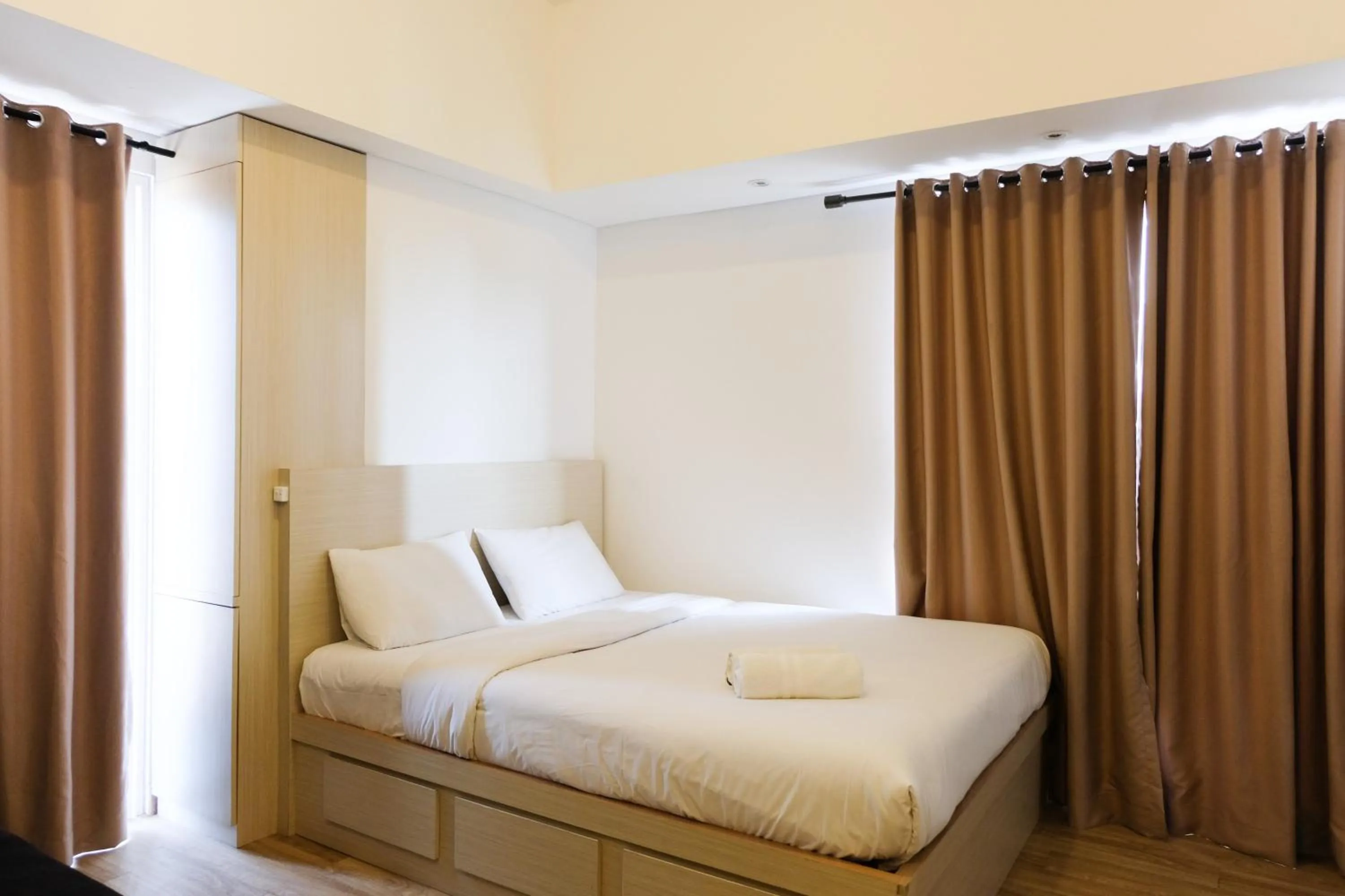 Bed in Cozy and Compact Casa De Parco Studio Apartment By Travelio