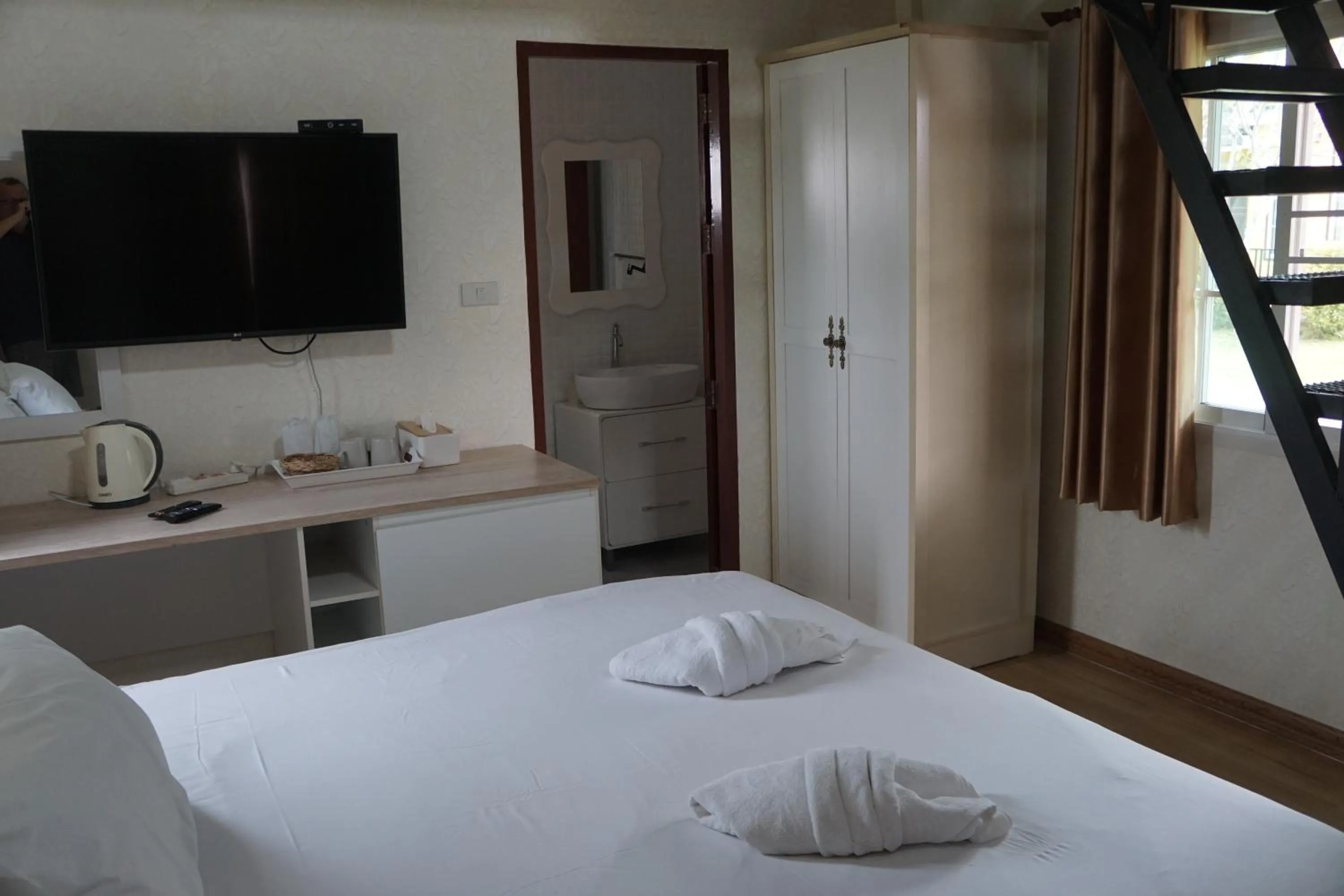 Bed in Evie Mae Resort