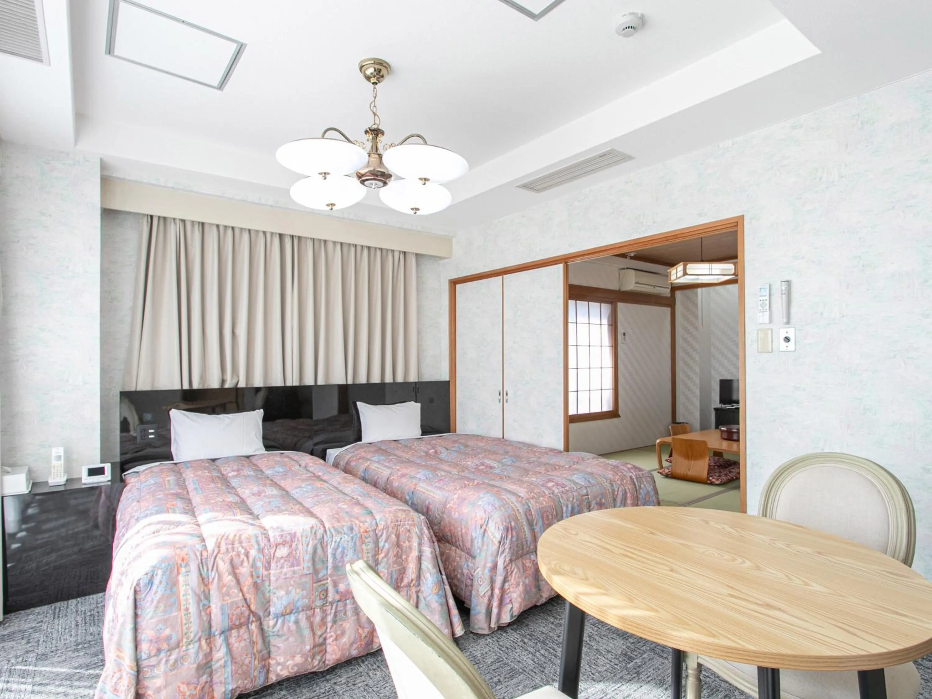 Bed in Aqua Garden Hotel Fukumaru