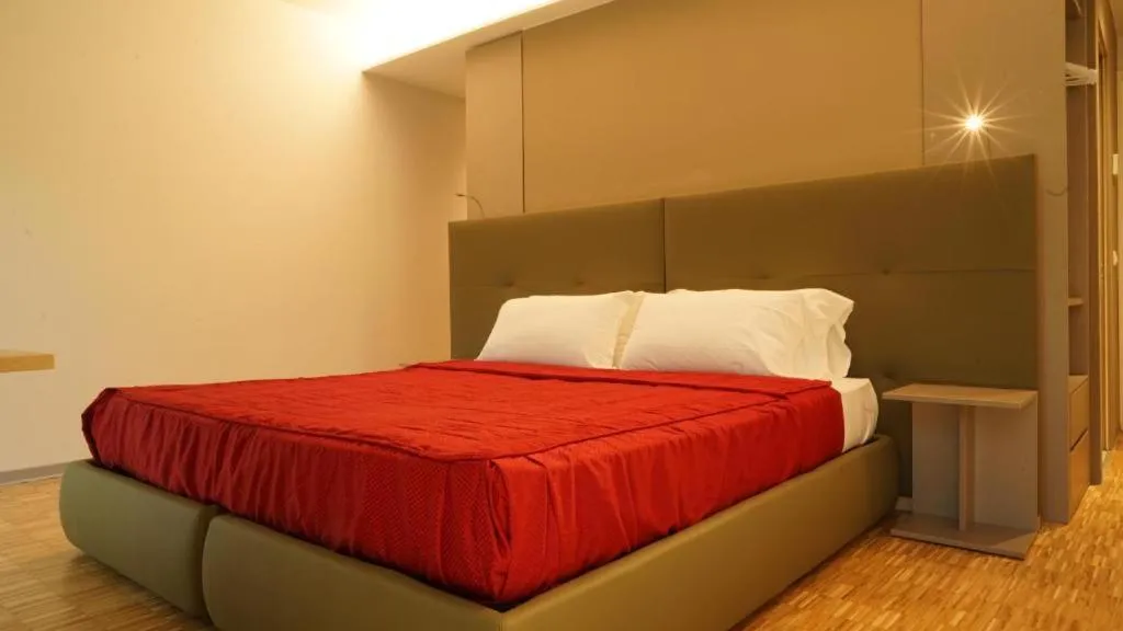 Bed in Valmarana Morosini Hotel